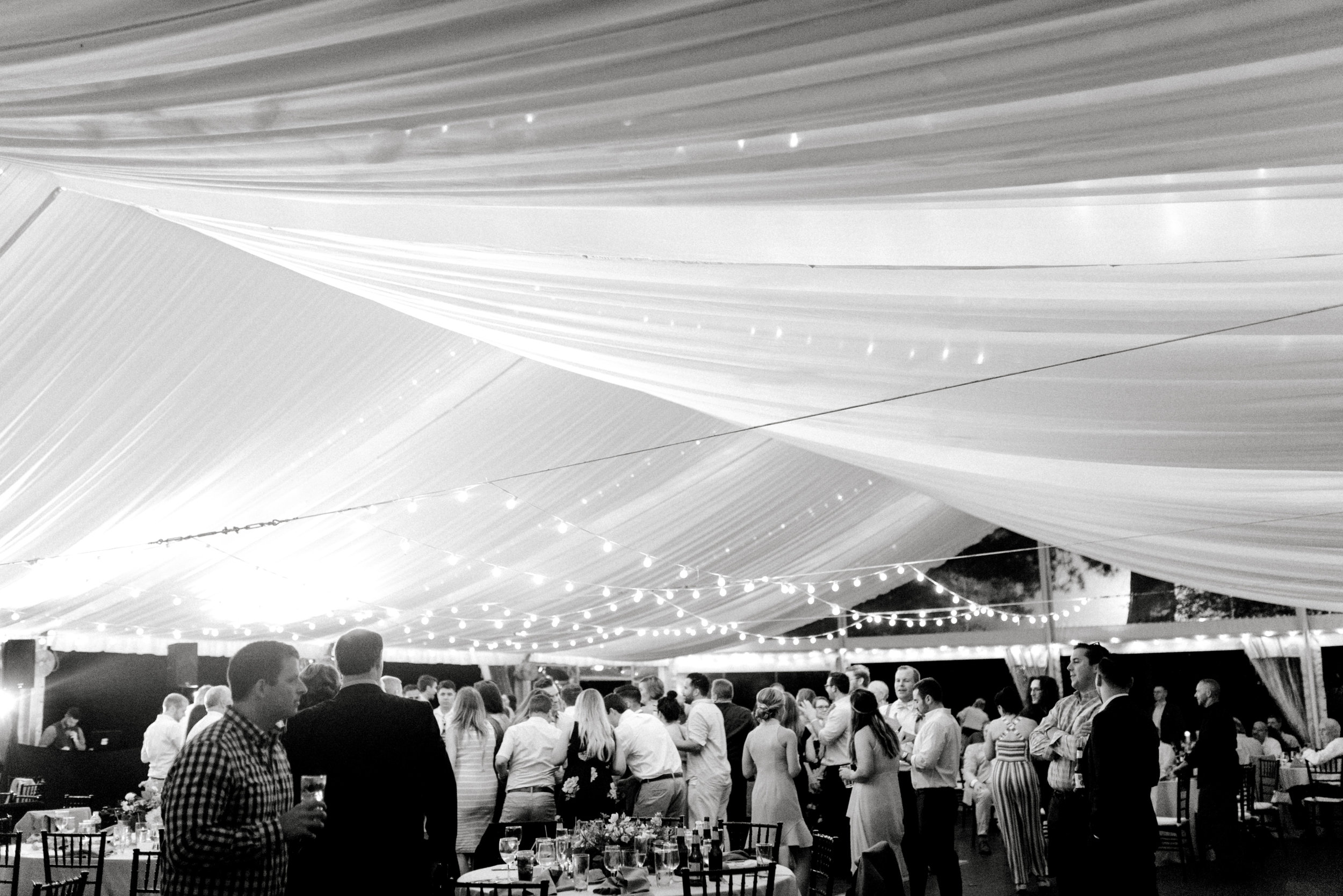 The party went on late into the night under the lighted tent for this bright boho chic Tyler Gardens wedding in Bucks County