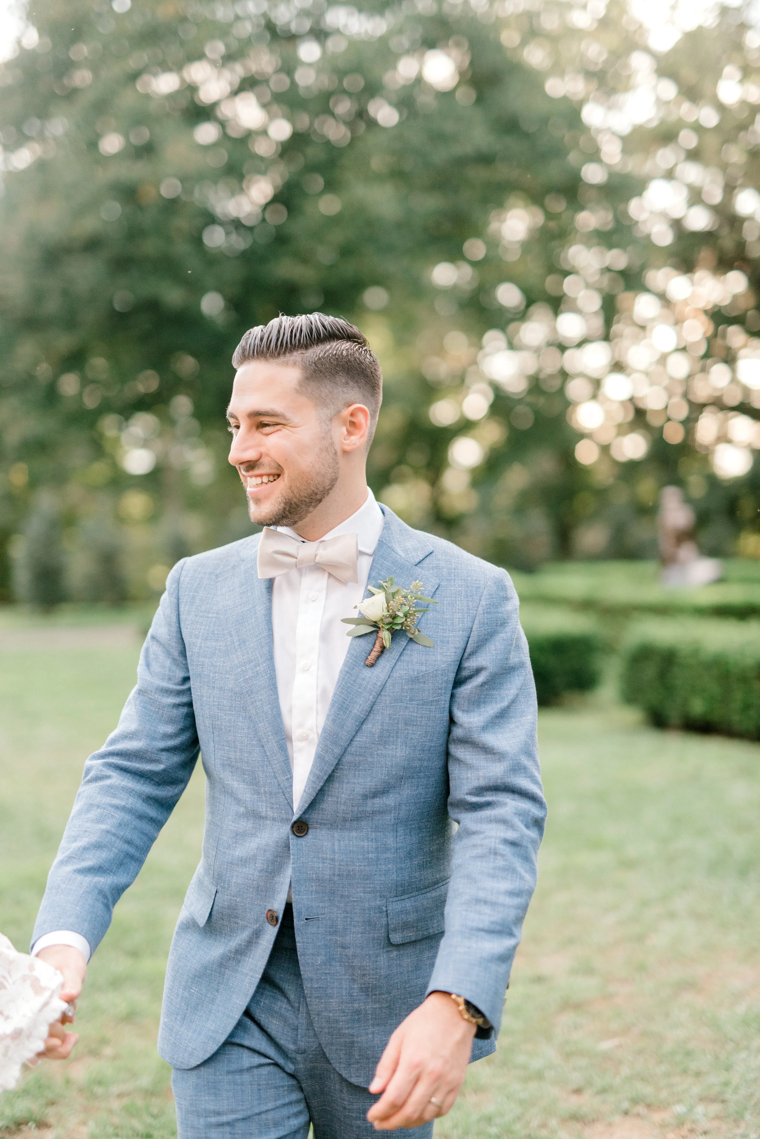We loved the stylish look of this sleek light blue suit that Mike wore to his bright boho chic Tyler Gardens wedding in Bucks County