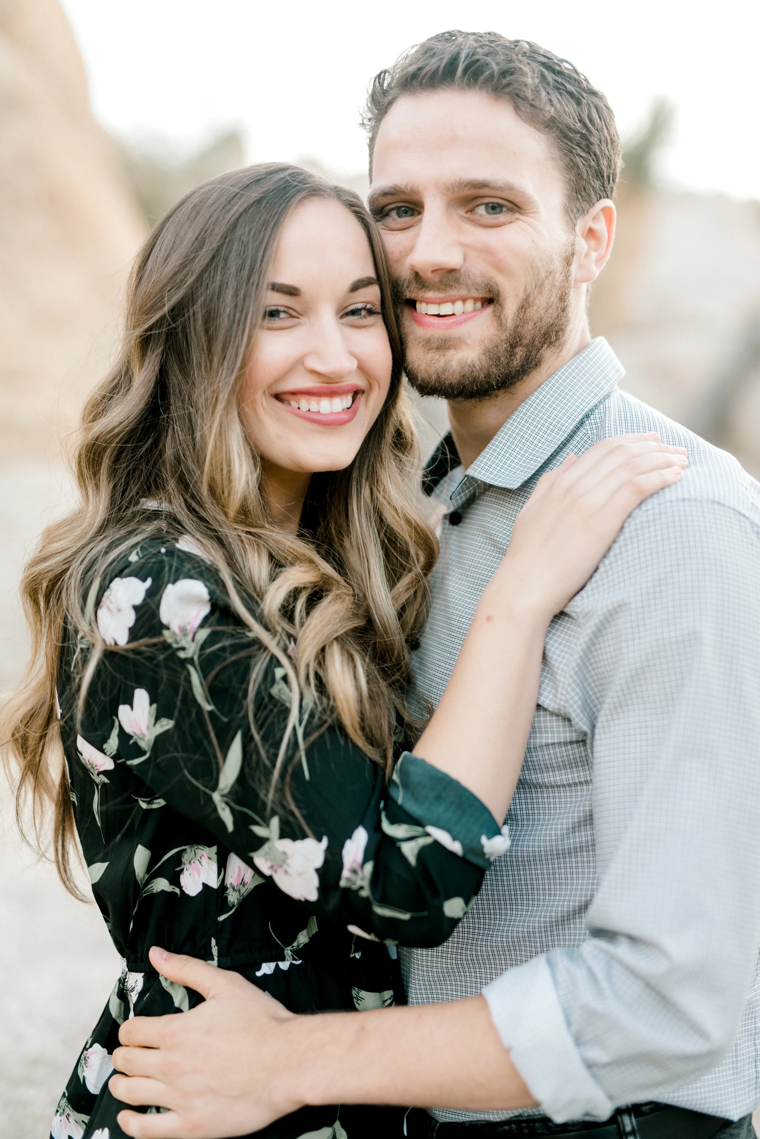 We can’t get over Jenna and Sam’s smiles from their free-spirited desert engagement session in Joshue Tree