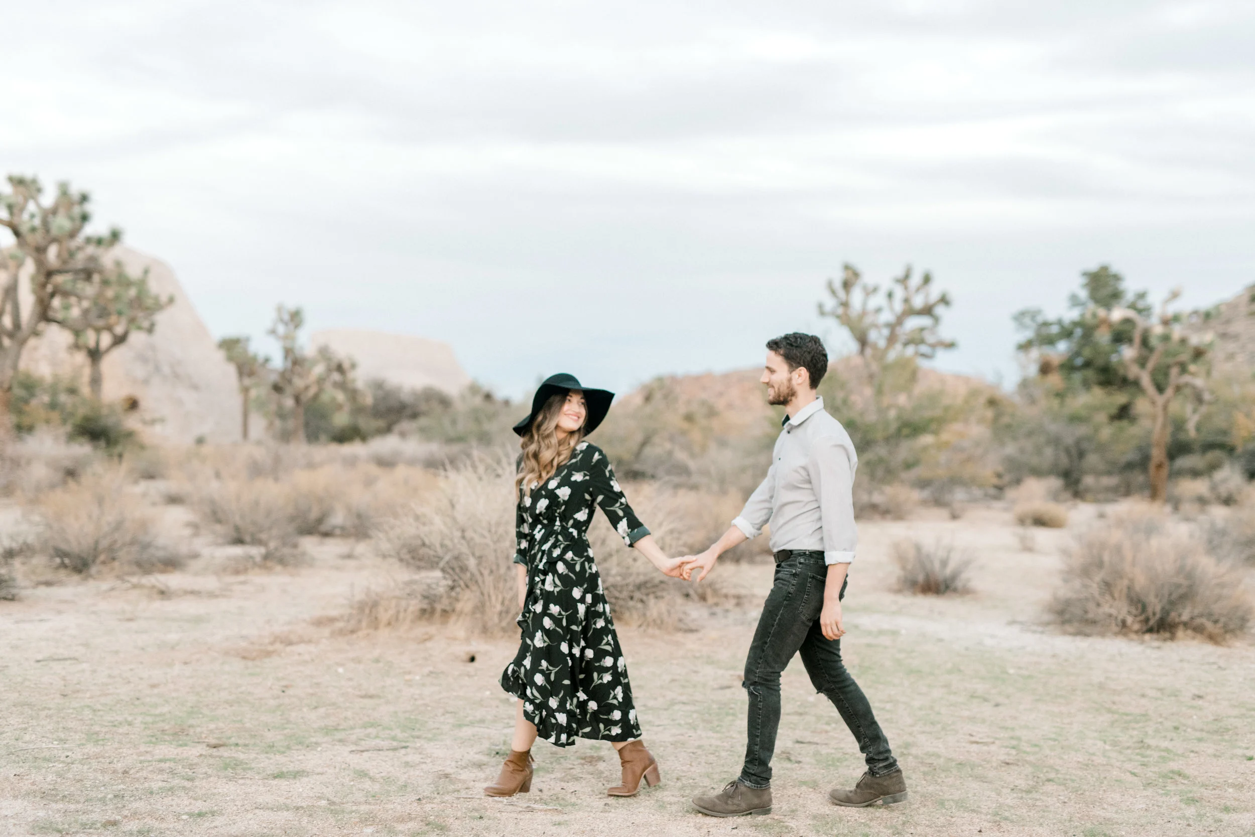 Follow me to forever, we are digging the boho vibes with this floral dress and floppy from Jenna and Sam’s free-spirited desert engagement session in Joshue Tree