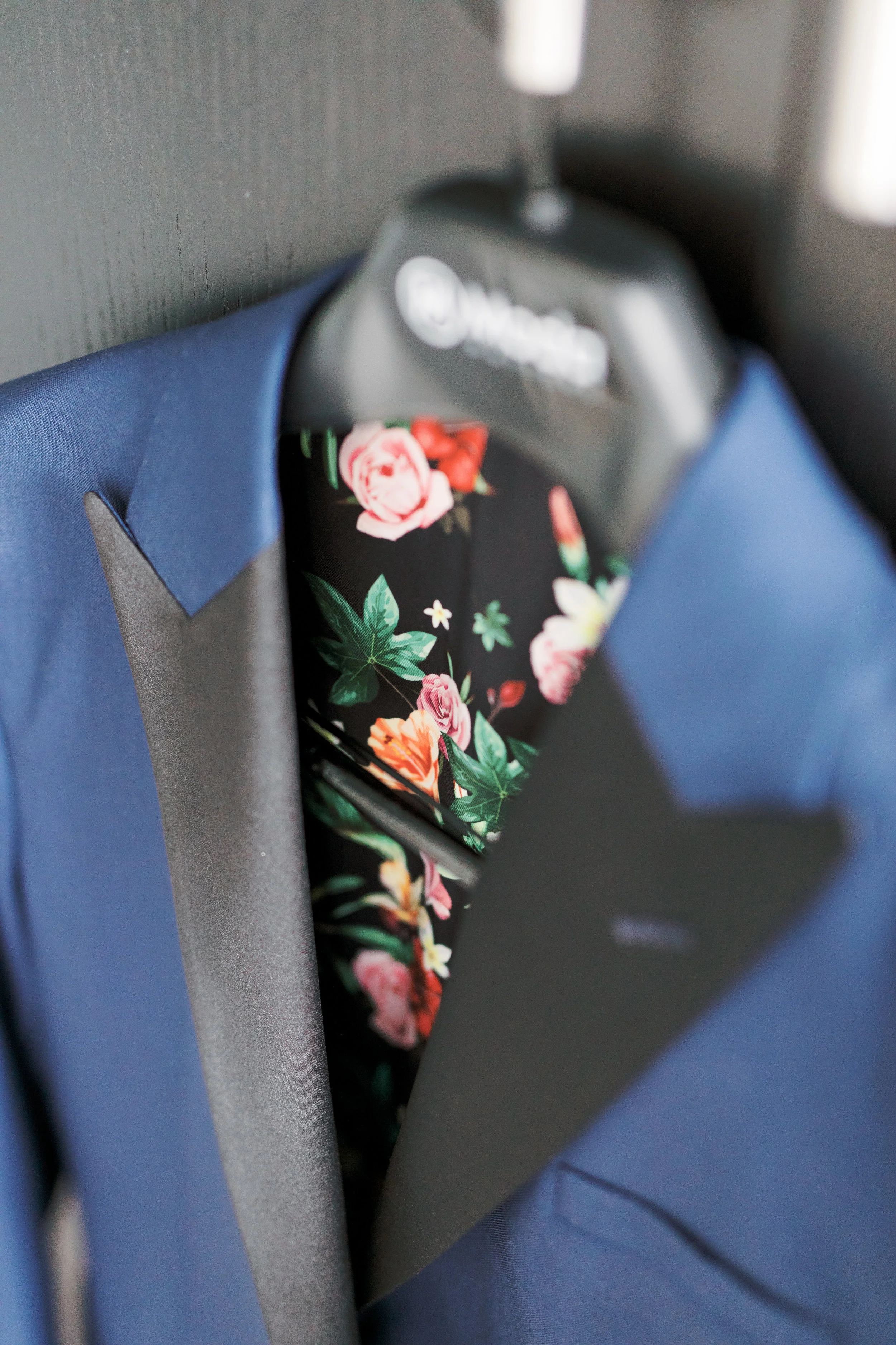 groom tux jacket with floral interior design
