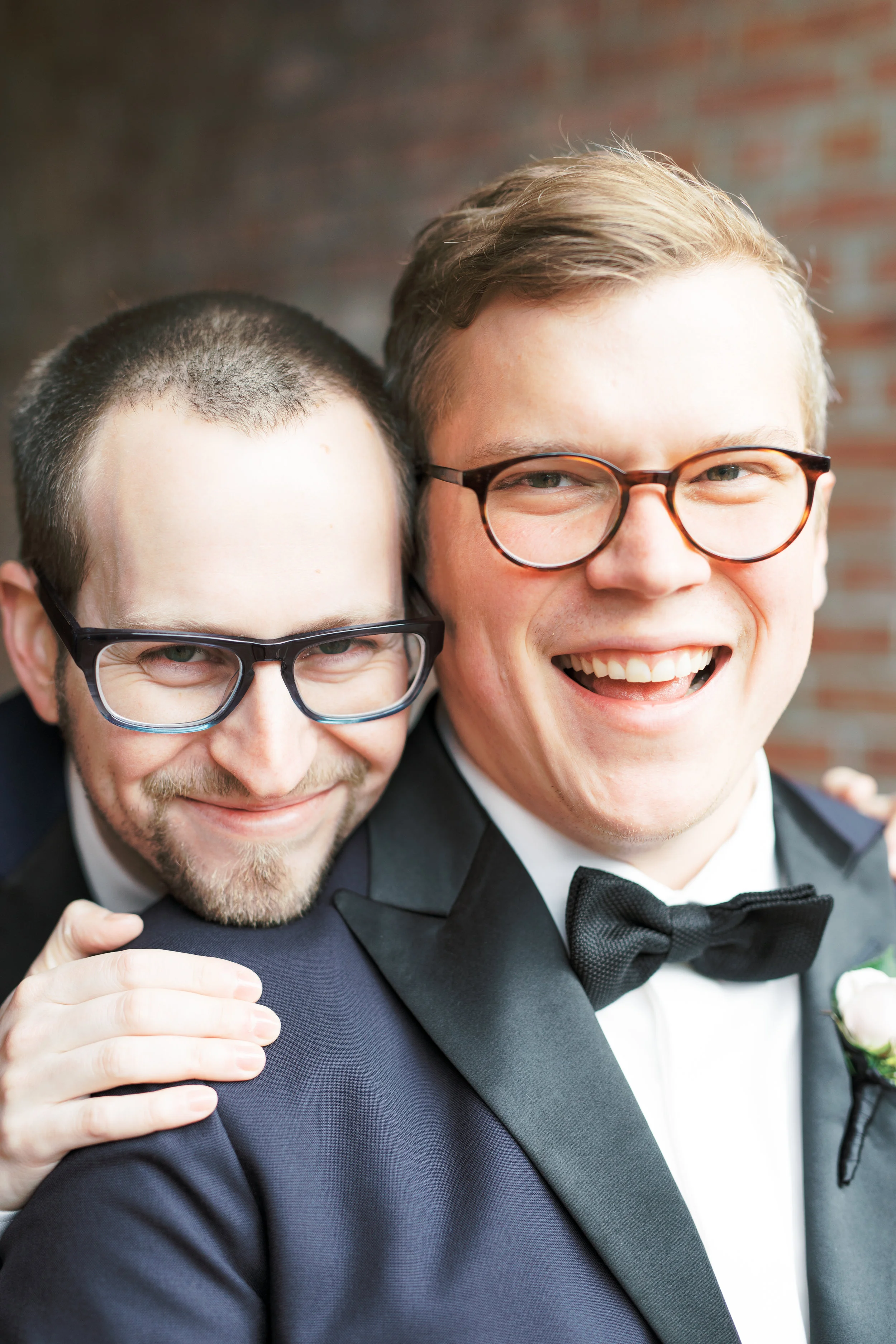 same sex wedding, two grooms with glasses on their Philadelphia wedding day, Old City Philadelphia
