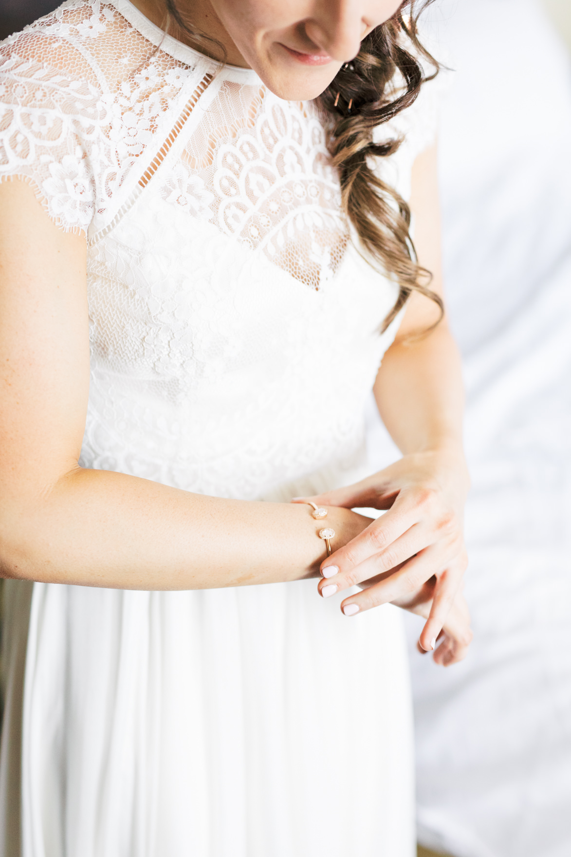 Those little finishing touches of putting on jewelry are some of our favorite moments to capture, like this shot of Missy getting ready for her modern and elegant old city Philadelphia wedding at Power Plant Productions. Power Plant Production wedding photographer