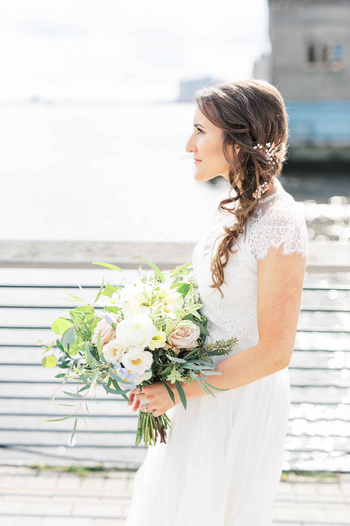 We love how Missy’s wedding day look came together, her fairytale like hair sweeping to the side in loose curls, her modern lace topped wedding dress, and a wild and whimsical bouquet from Vault + Vine made this day a truly modern and elegant old city Philadelphia Power Plant Productions wedding. Power Plant Production wedding photographer