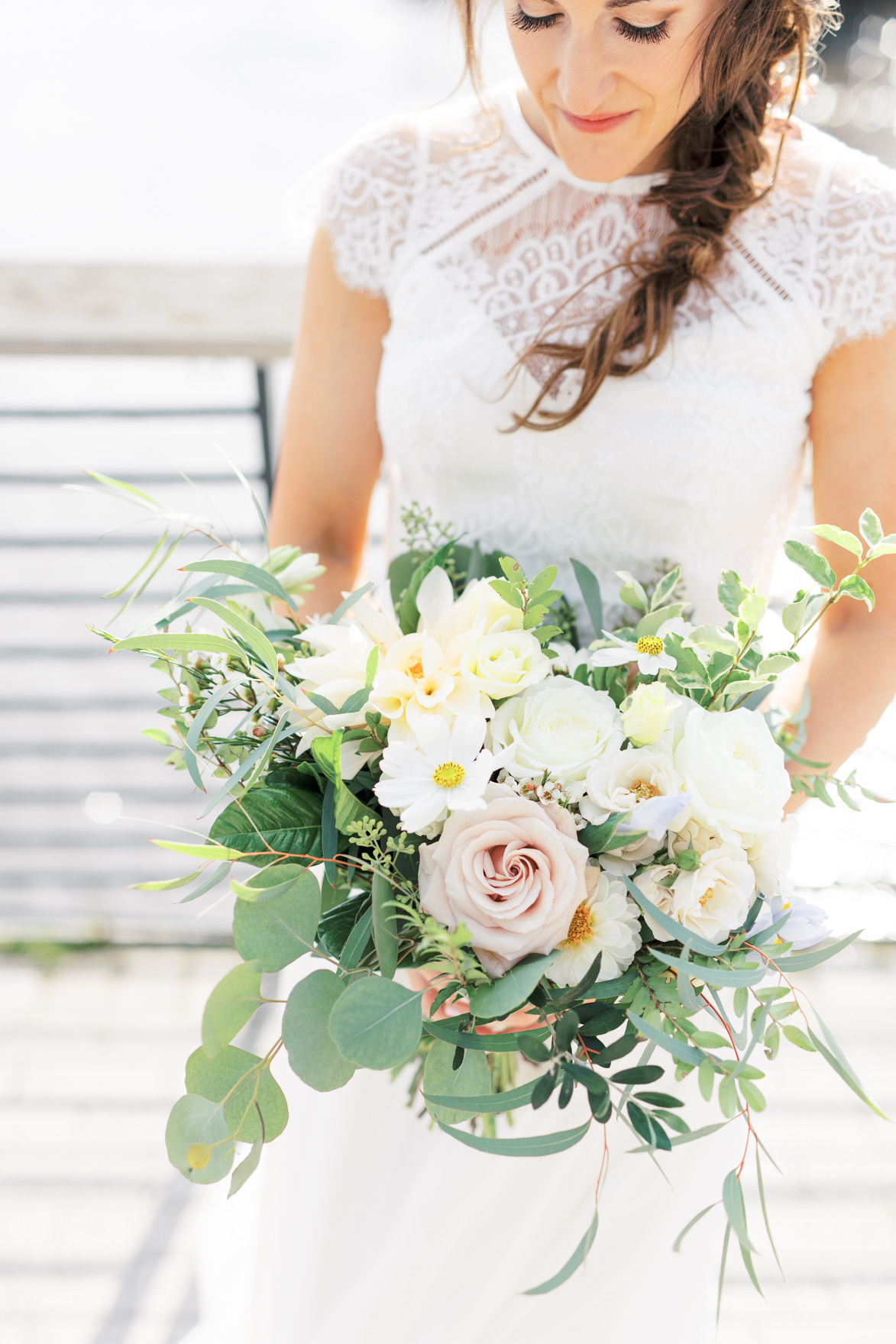 We cannot get over how gorgeous this wild and whimsical bouquet from Vault + Vine is. It’s mostly neutral shades of white and blush, but little pops of yellow really made this arrangement shine for Missy and Dani’s modern and elegant old city Philadelphia Power Plant Productions wedding. Power Plant Production wedding photographer