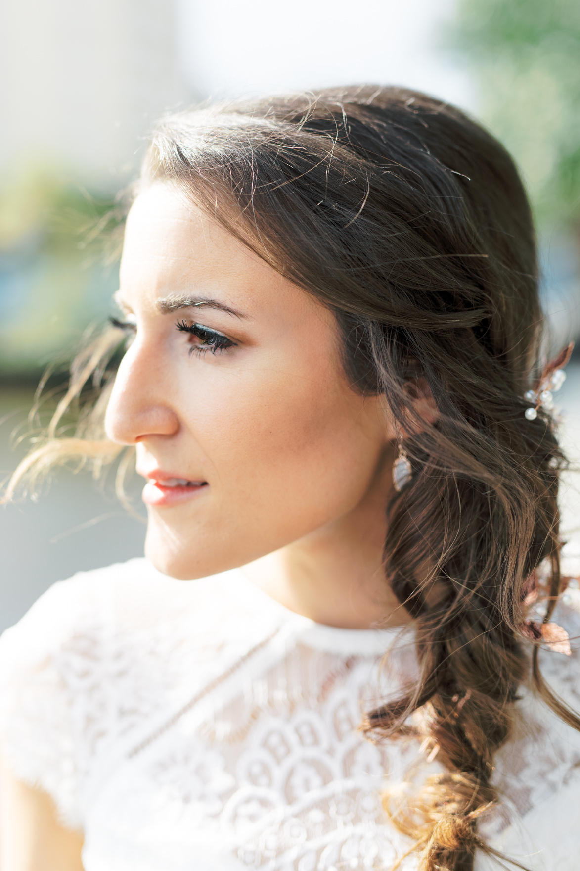 We love how soft and romantic Missy’s draped side hairdo with soft curls was for her modern and elegant old city Philadelphia Power Plant Productions wedding. Power Plant Production wedding photographer