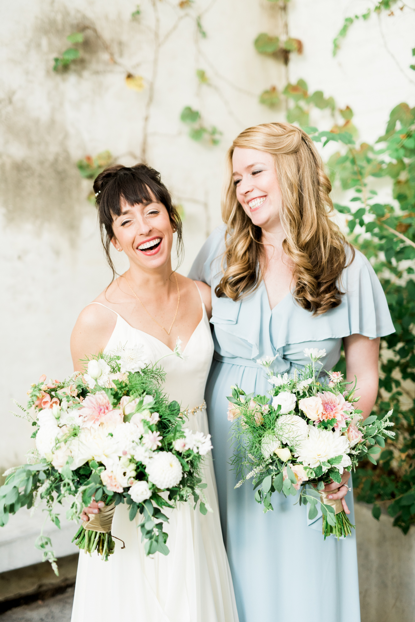 Trish is all smiles on her wedding day, getting married in a magical garden tucked away on an unsuspecting block in Philadelphia. We love this little oasis in the city for a modern couple wanting to get married in a cool space. Maas Building wedding photographer.