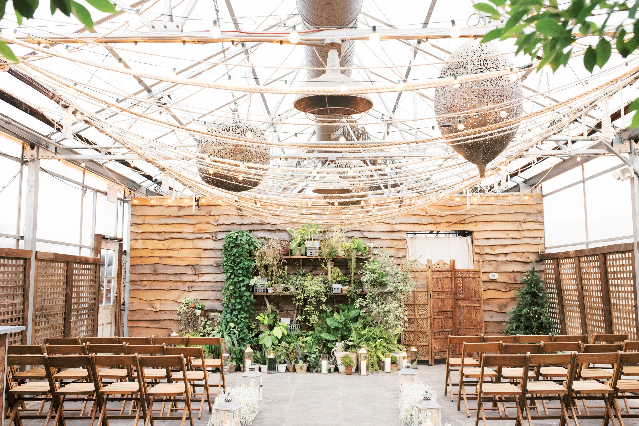 We love the rustic plant filled greenhouse at Terrain. They make the perfect spot for your chic boho wedding. Top 20 Philadelphia wedding venues. Terrain wedding photographer