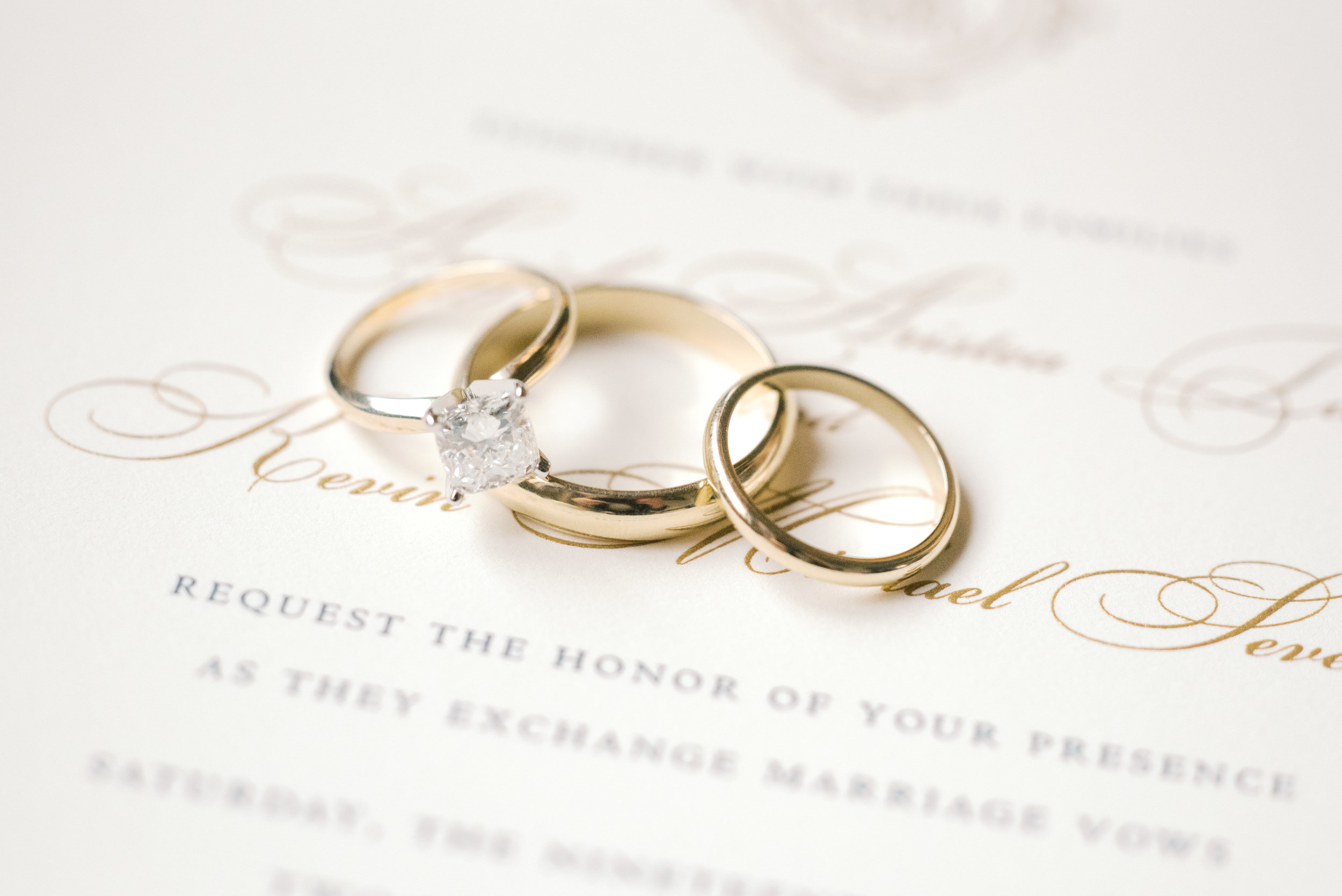 We love these classic gold wedding bands with a white diamond engagement ring from this romantic and classic wedding day for their french inspired green and white Cairnwood Estate wedding