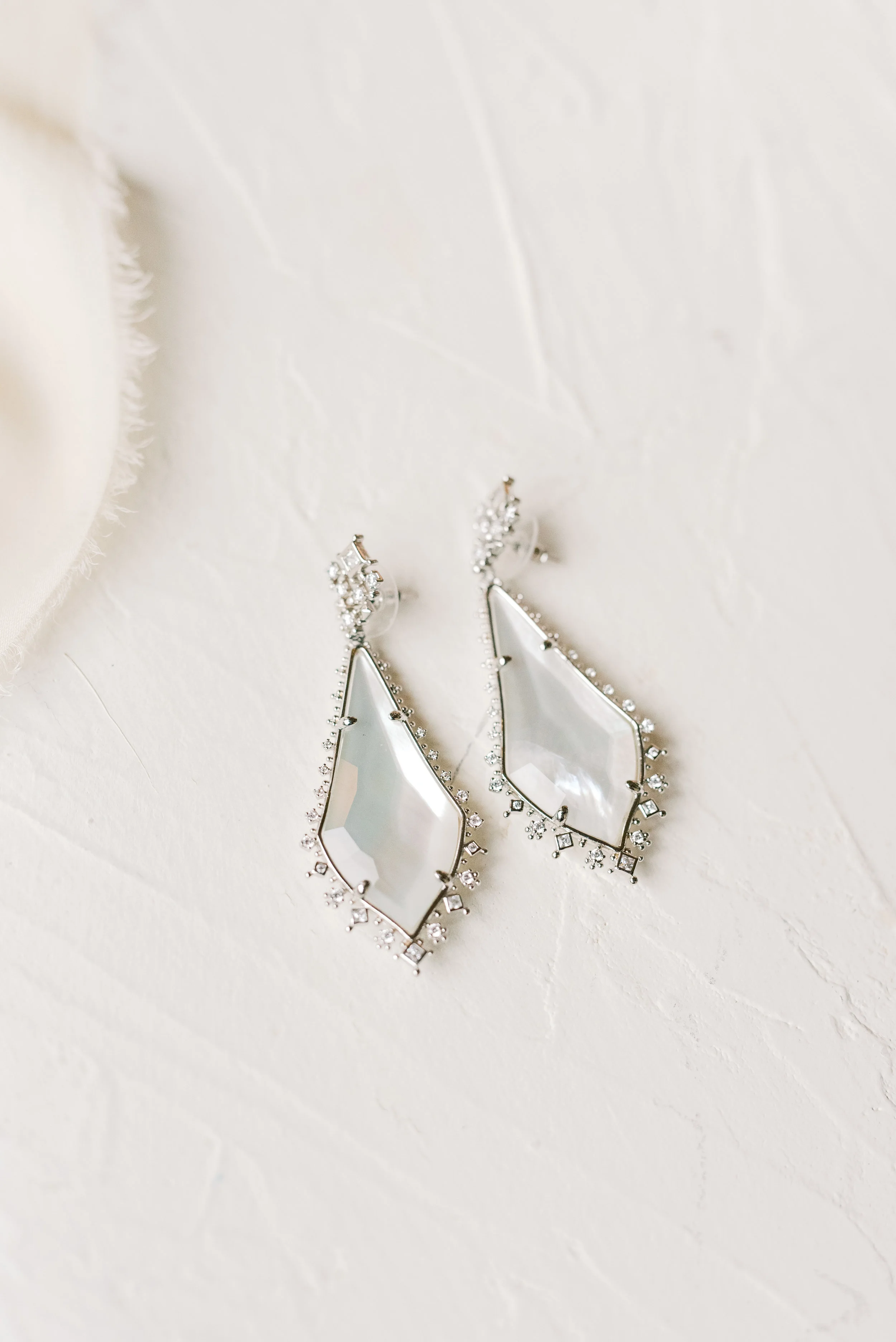 These stylish teardrop earrings with a little extra bling added just a touch of sparkle to this romantic and classic wedding day for their french inspired green and white Cairnwood Estate wedding.