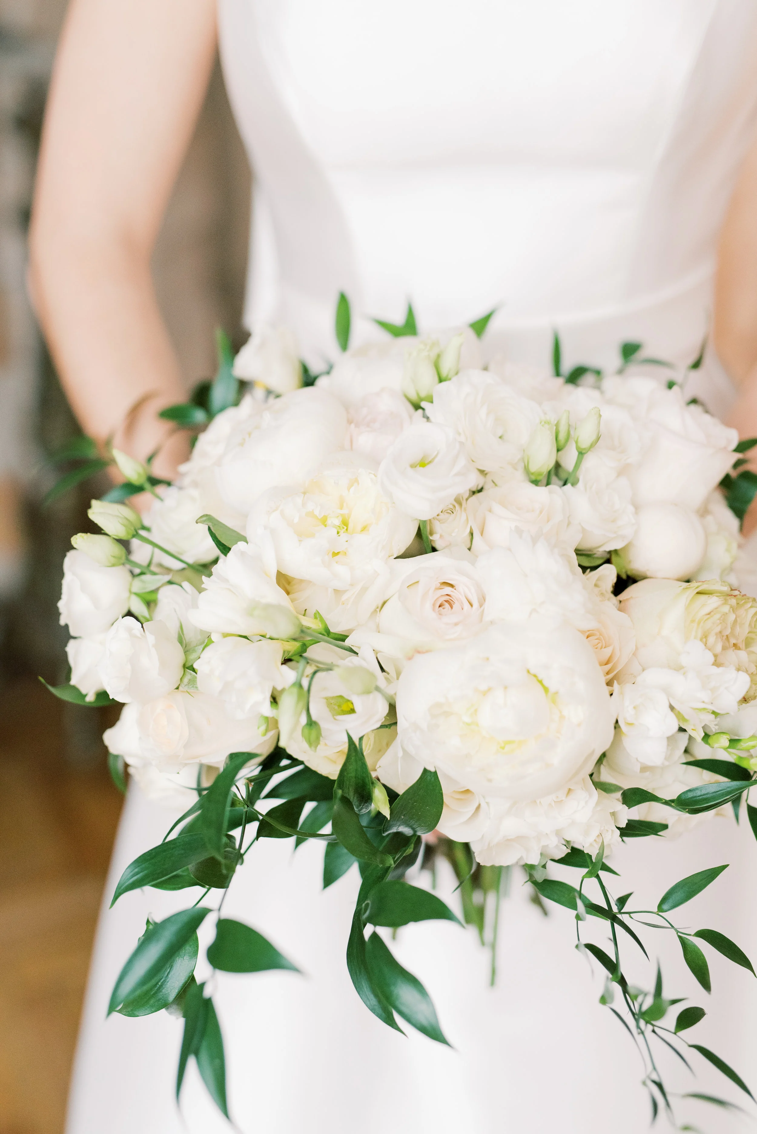 We loved this classic white bouquet with trailing greens from this romantic and classic wedding day for their french inspired green and white Cairnwood Estate wedding
