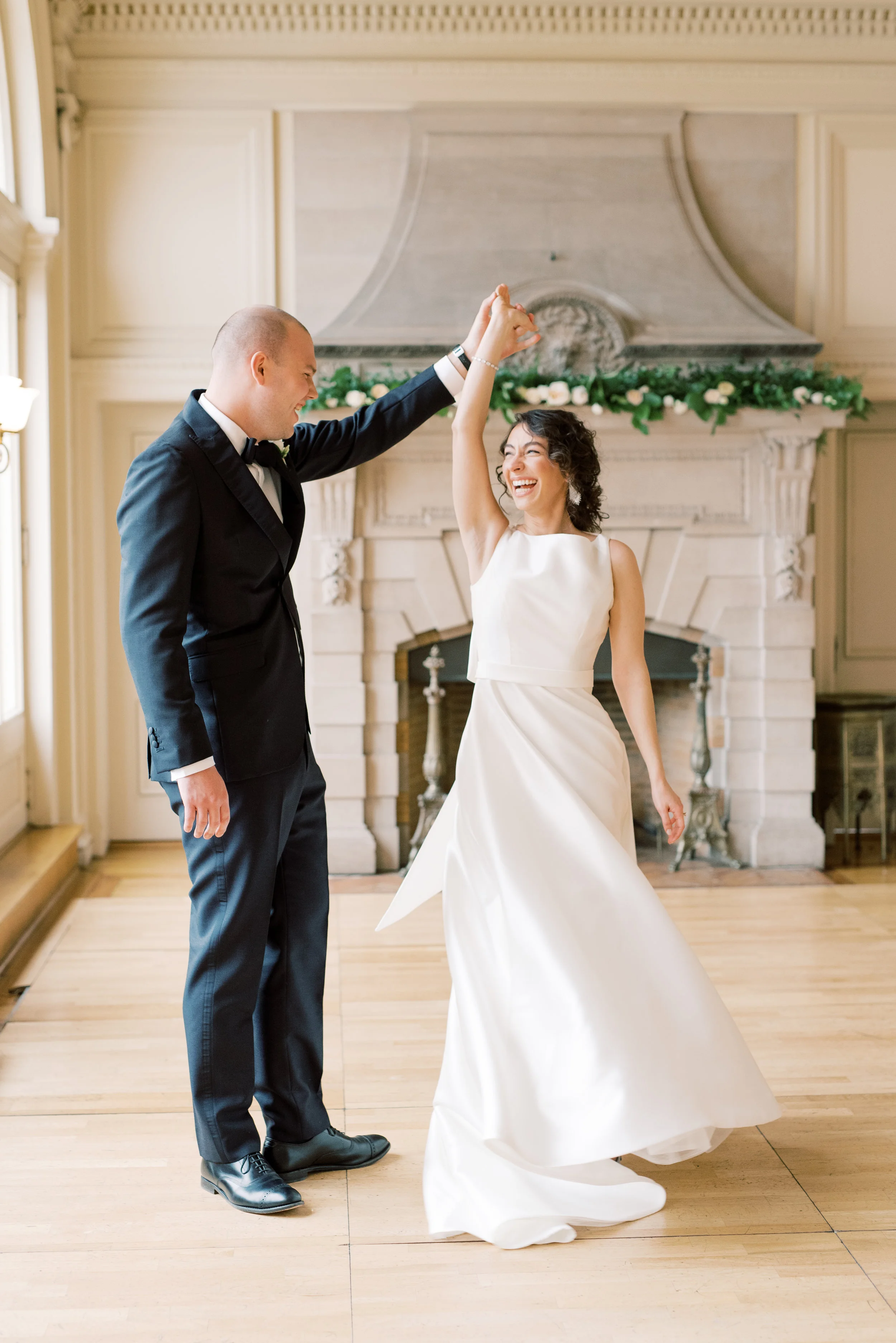 We love the romantic gesture of a twirl and how it brings out such a big smile in our brides, like on this romantic and classic wedding day for their french inspired green and white Cairnwood Estate wedding.
