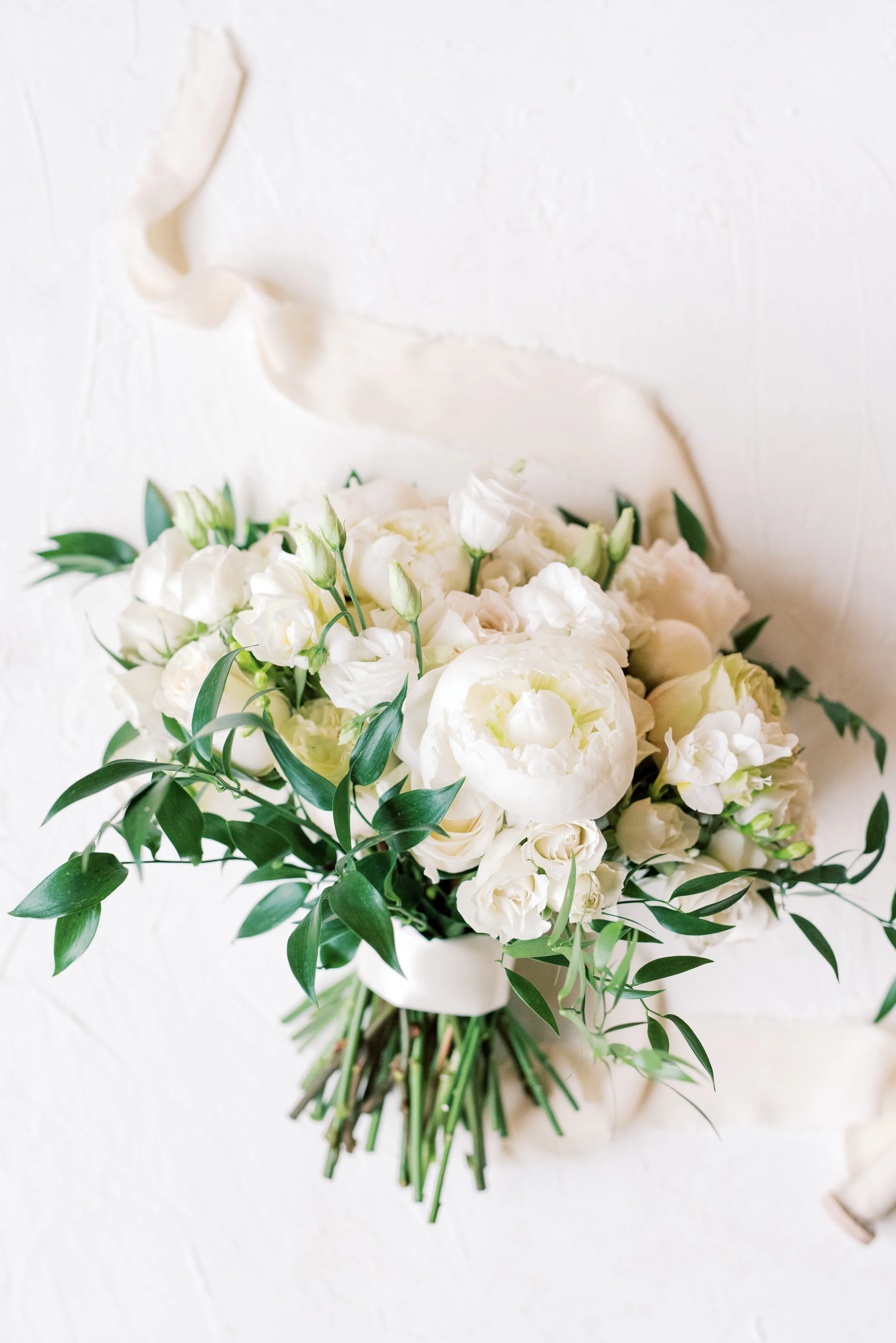 White and a little wild, the perfect classic bouquet for this romantic and classic wedding day for their french inspired green and white Cairnwood Estate wedding