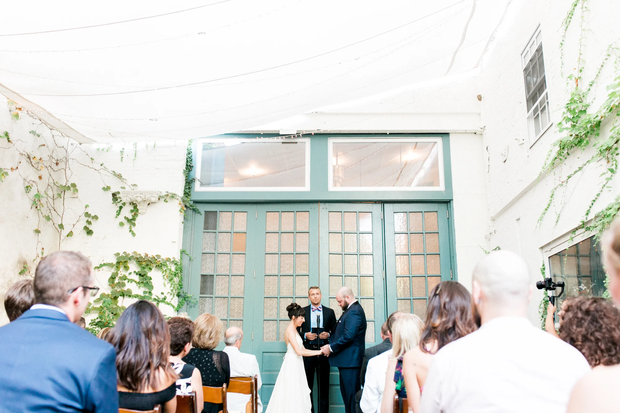 The vine covered walls of the urban garden at the Maas Building make it an obvious dreamy location for a spot on our top 20 Philadelphia wedding venues. We love this little oasis in the city for a modern couple wanting to get married in a cool space. Maas Building wedding photographer.