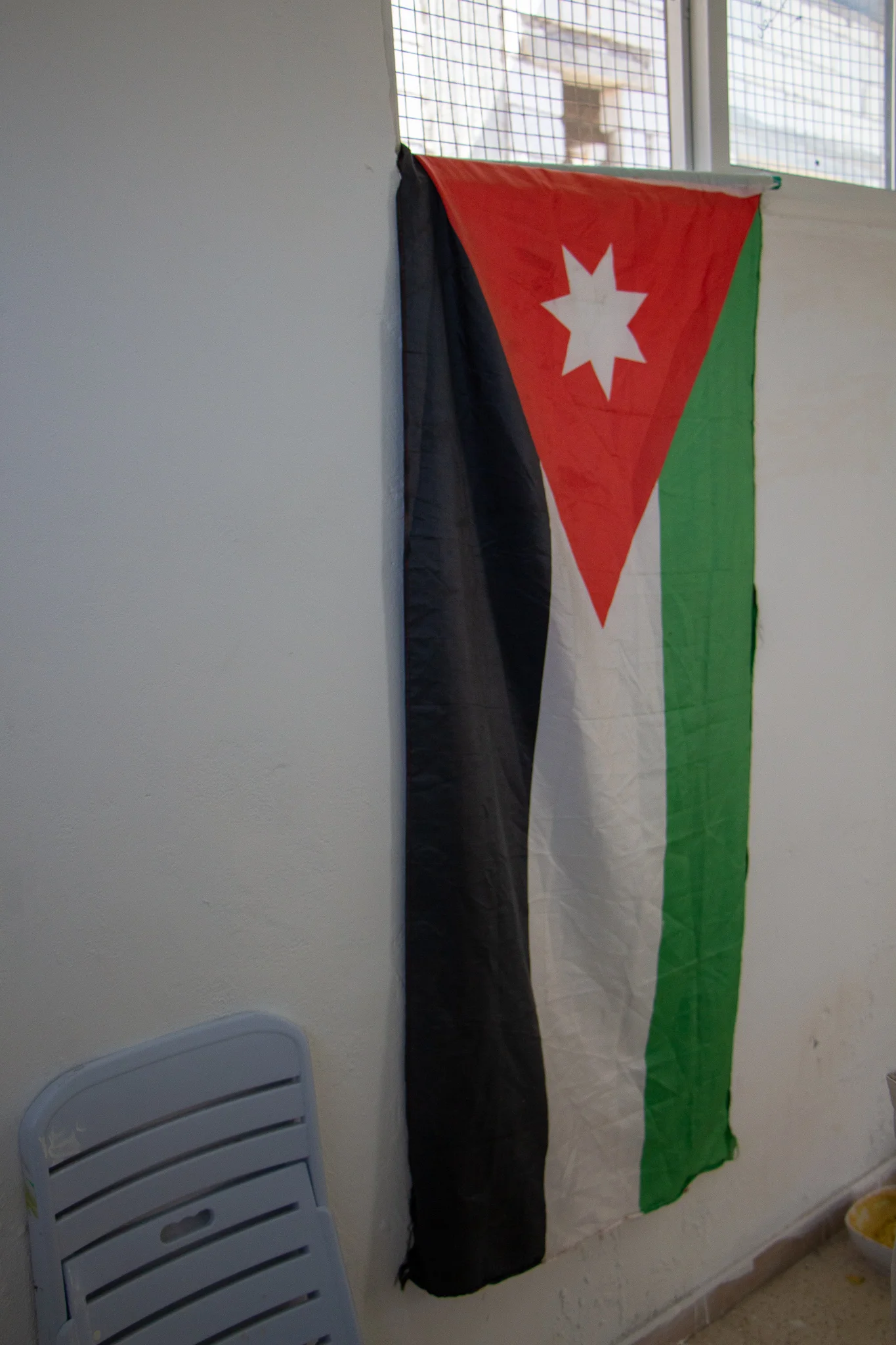 A Jordanian flag hangs inside a One Love classroom