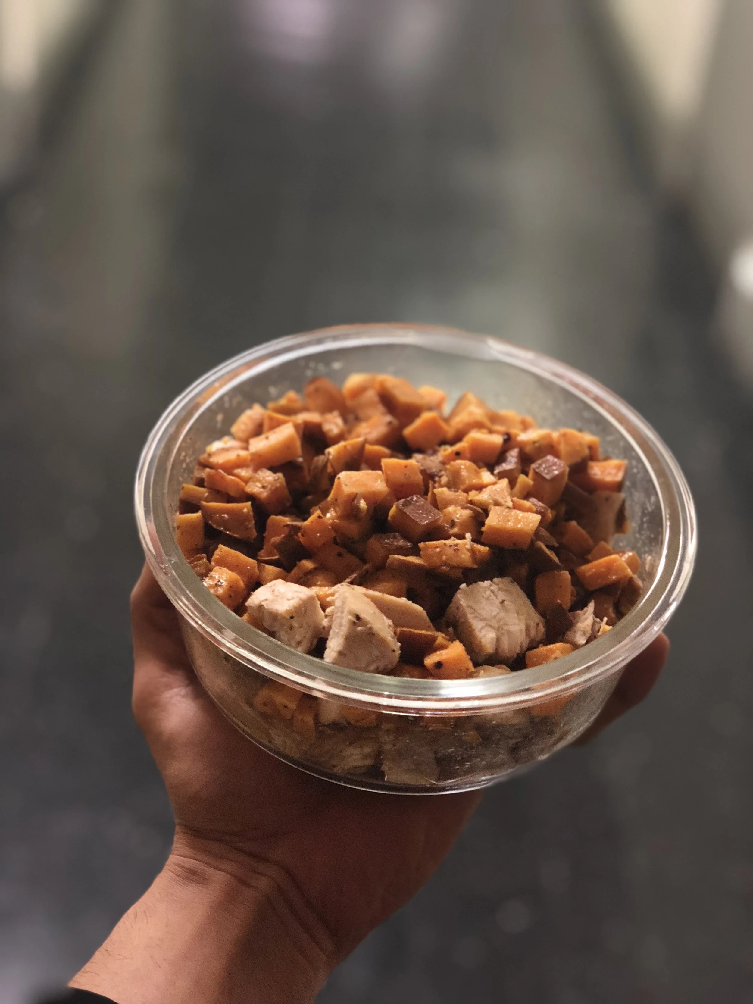 DINNER TIME! This is usually between 7-8 PM. So you can get an idea of the complete spread. 1 chicken breast with 1 baked and cut up sweet potato! I love, love, love this dinner and could eat it everyday. But more so because I should change it up rather than I feel the need to...