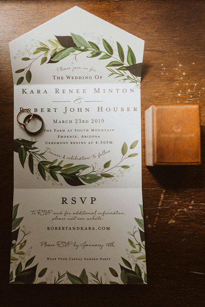 wedding_invitation_with_leaves_and_rings.jpg
