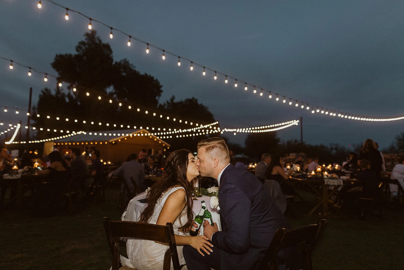 kiss_under_lights_at_the_farm.jpeg