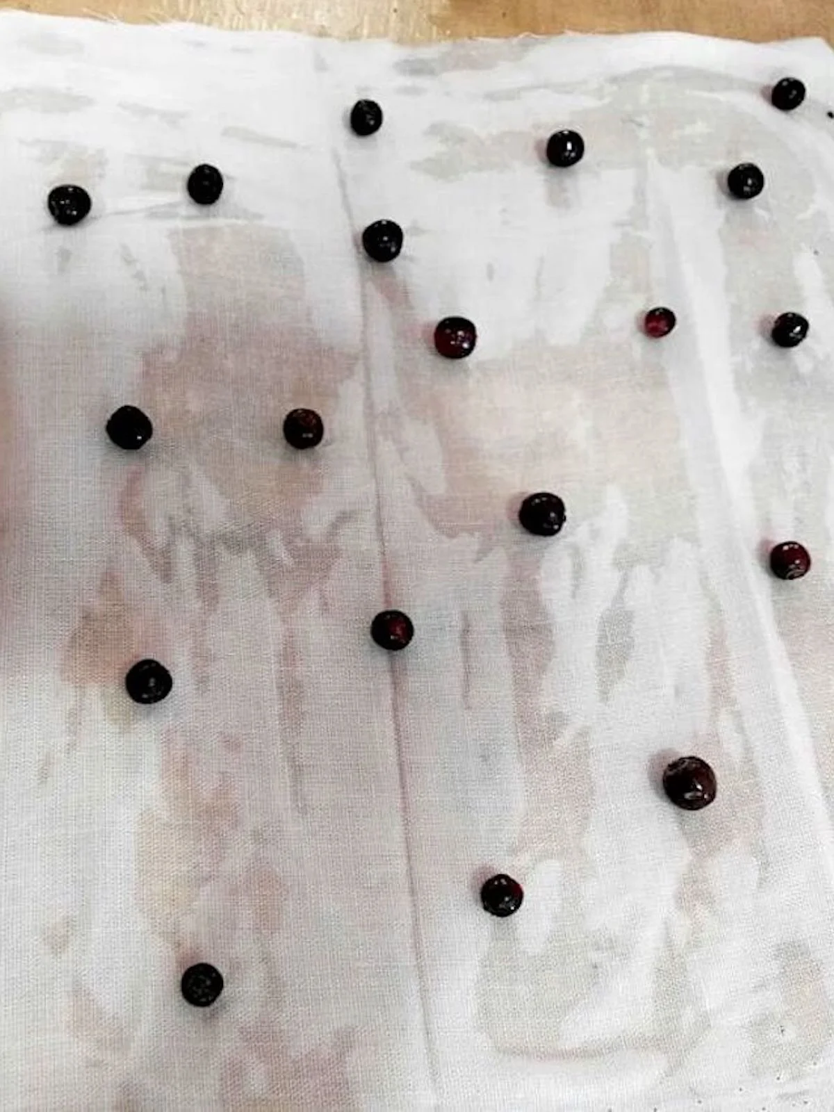 The berries are rubbed with salt on linen