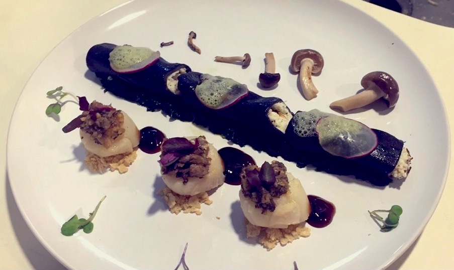 Squid-ink ricotta cannelloni, seared scallops, porcini butter