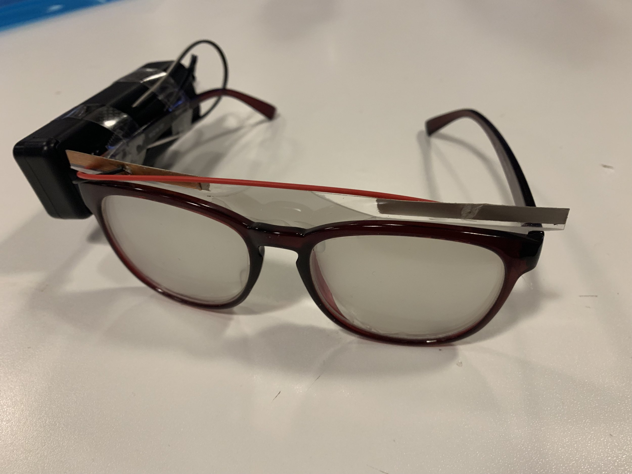 Hardware prototype: electrochromic film on glasses lenses