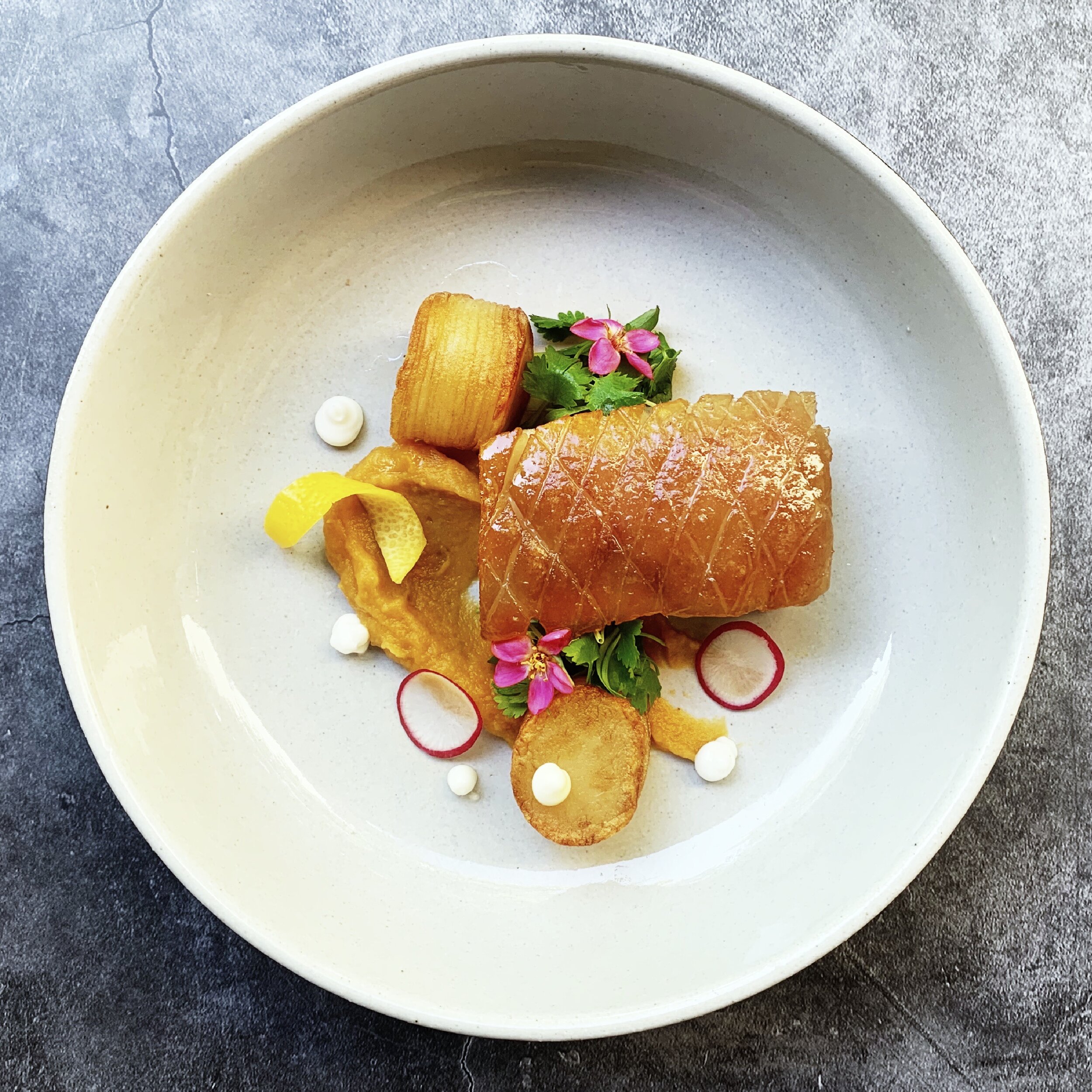 Pork belly and pomme lyonnaise