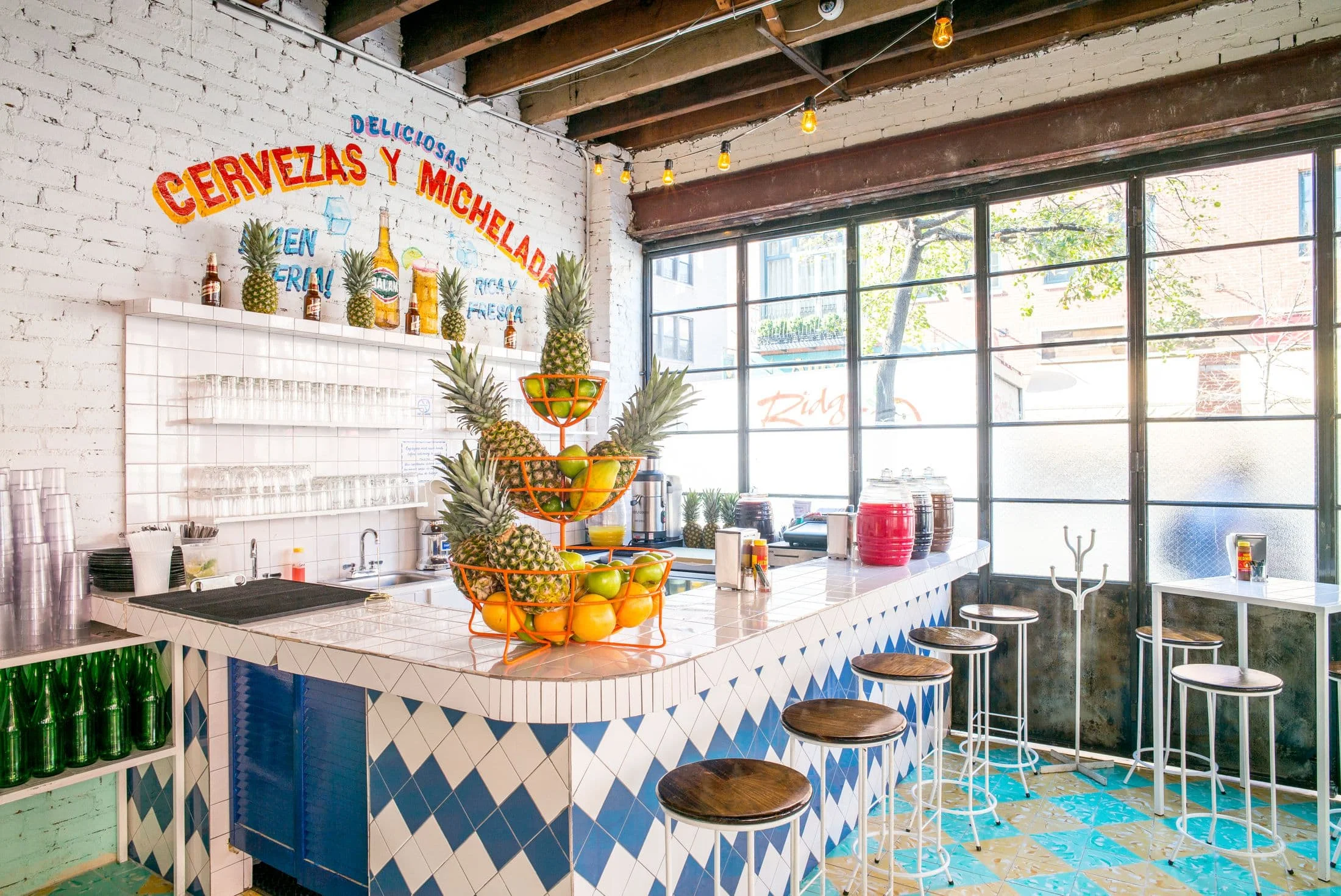 Tacombi is a taqueria that serves up excellent tacos in a wholly welcoming and well decor-ed interior, photo from EATER 