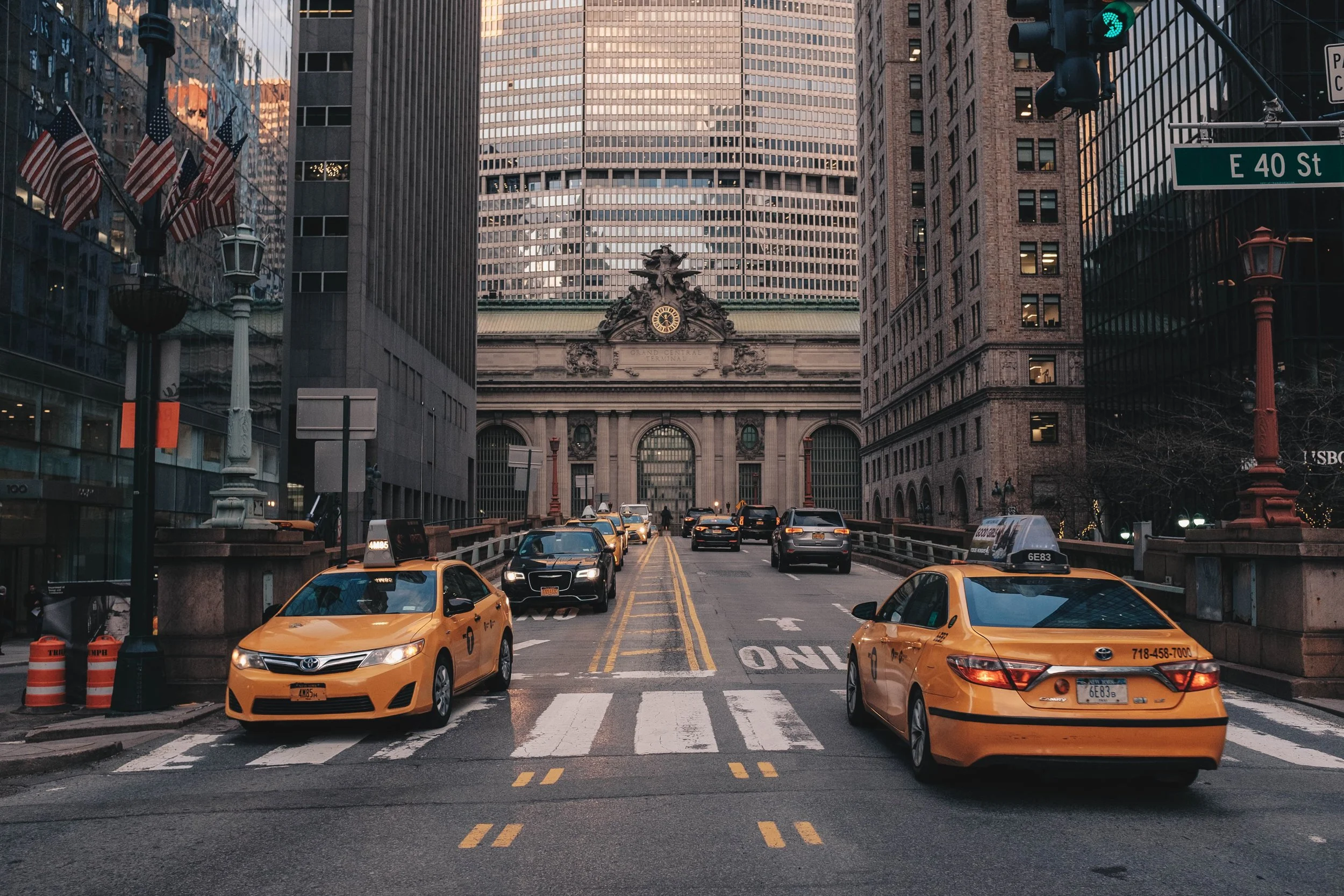 With Grand Central Terminal in the background, two of New York City's iconic modes of transport are juxtaposed as a shining model of mobility