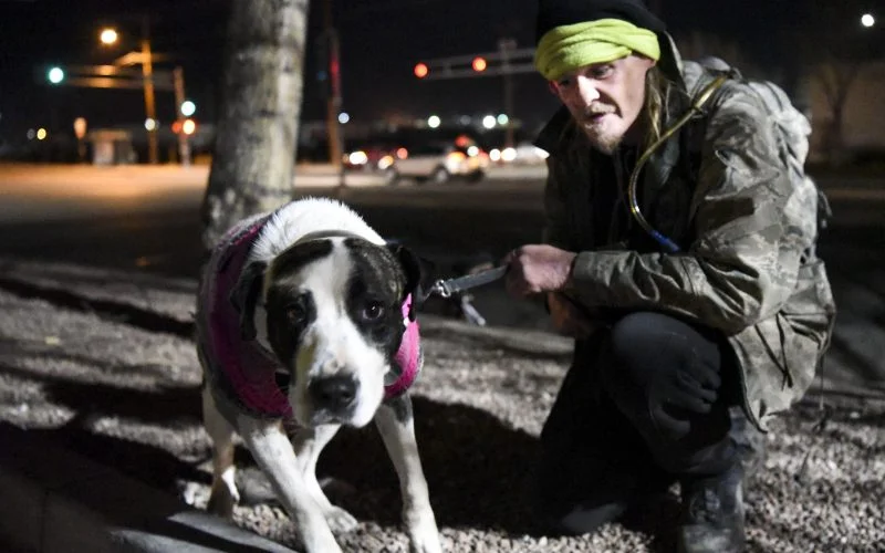 The Hellfighters have been feeding Hillbilly and his dog Nivea for two-and-a-half years. If Hillbilly can’t make it out to meet the Hellfighters, they ride their motorcycles down a bike path to the camp where Hillbilly and Nivea stay most nights. Feb. 02, 2019. /Photo by Celia Raney/ NM News Port 
