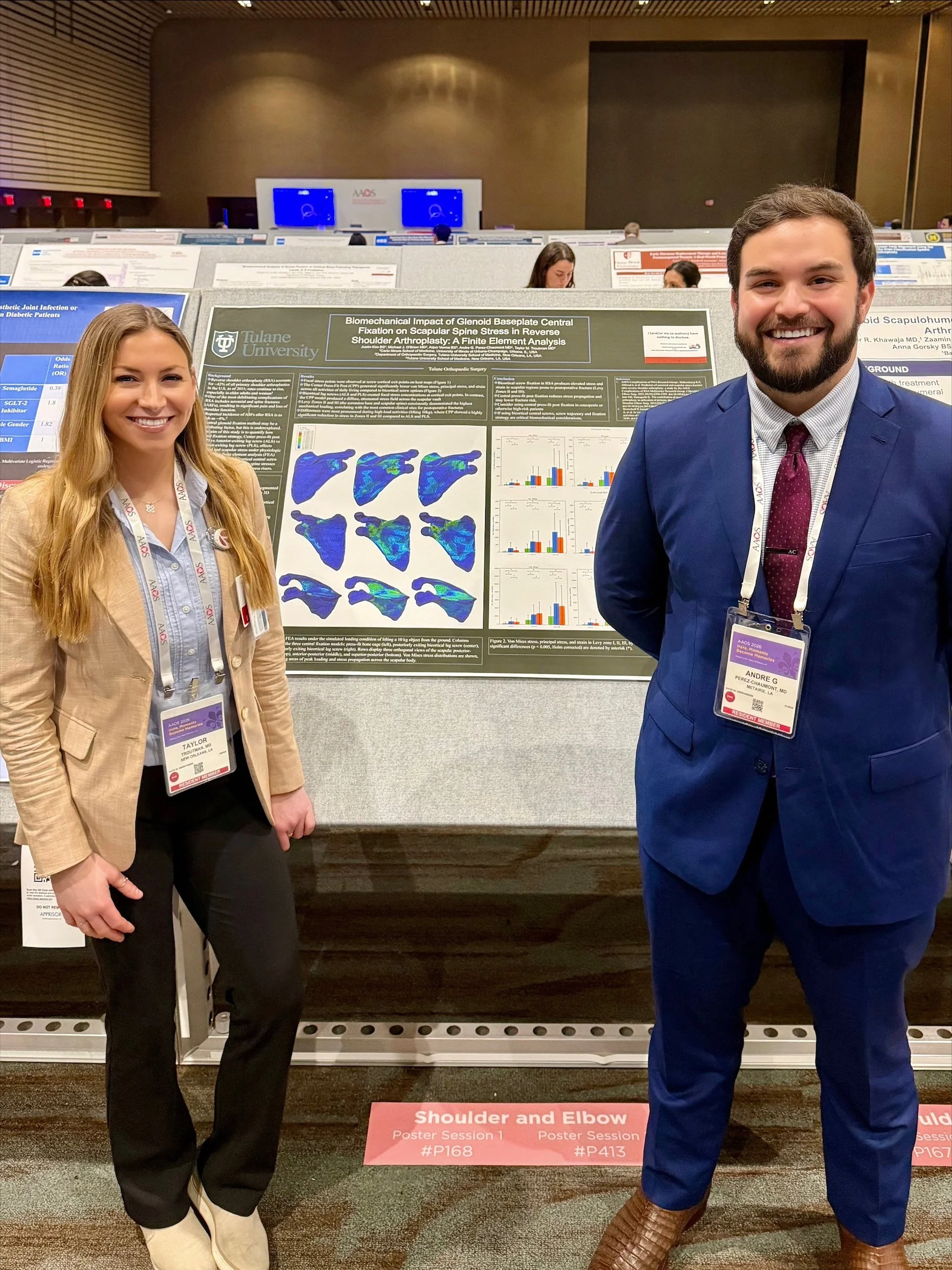 Andre and Taylor with poster.jpeg