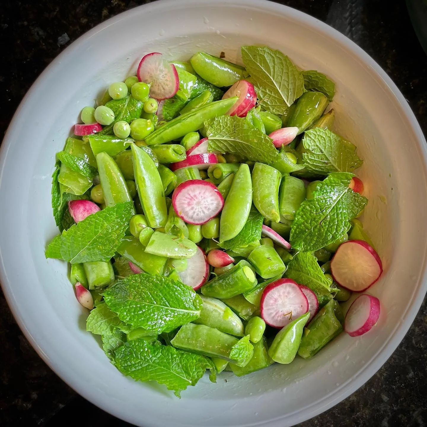 Today I&rsquo;ll celebrate the bounty of the garden. And wonder how I ever lived without it. #peas #radish #mint