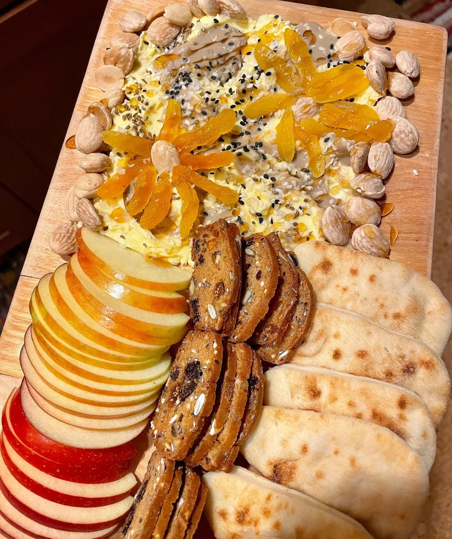 Do I even exist if I don&rsquo;t post my #butterboard ?? 🤣 This one had a hawaij-spiced tahini swirled through the butter, black and white sesame seeds, anise seeds, flaky salt and a drizzle of hot honey. Oh and apricot and almond &ldquo;flowers&rdq