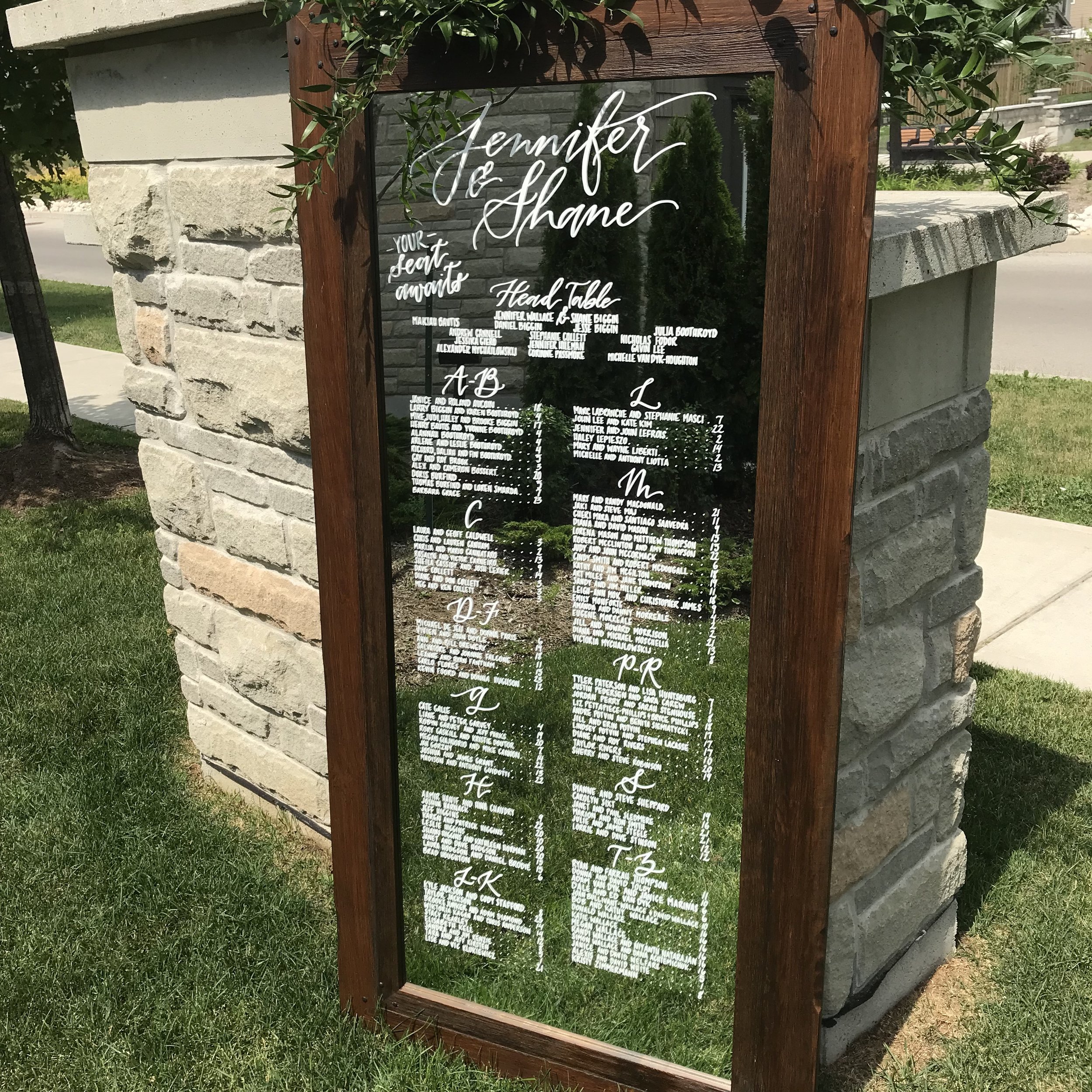 Wedding Mirror Seating Chart hand lettered by Crystalline Script in Guelph Ontario