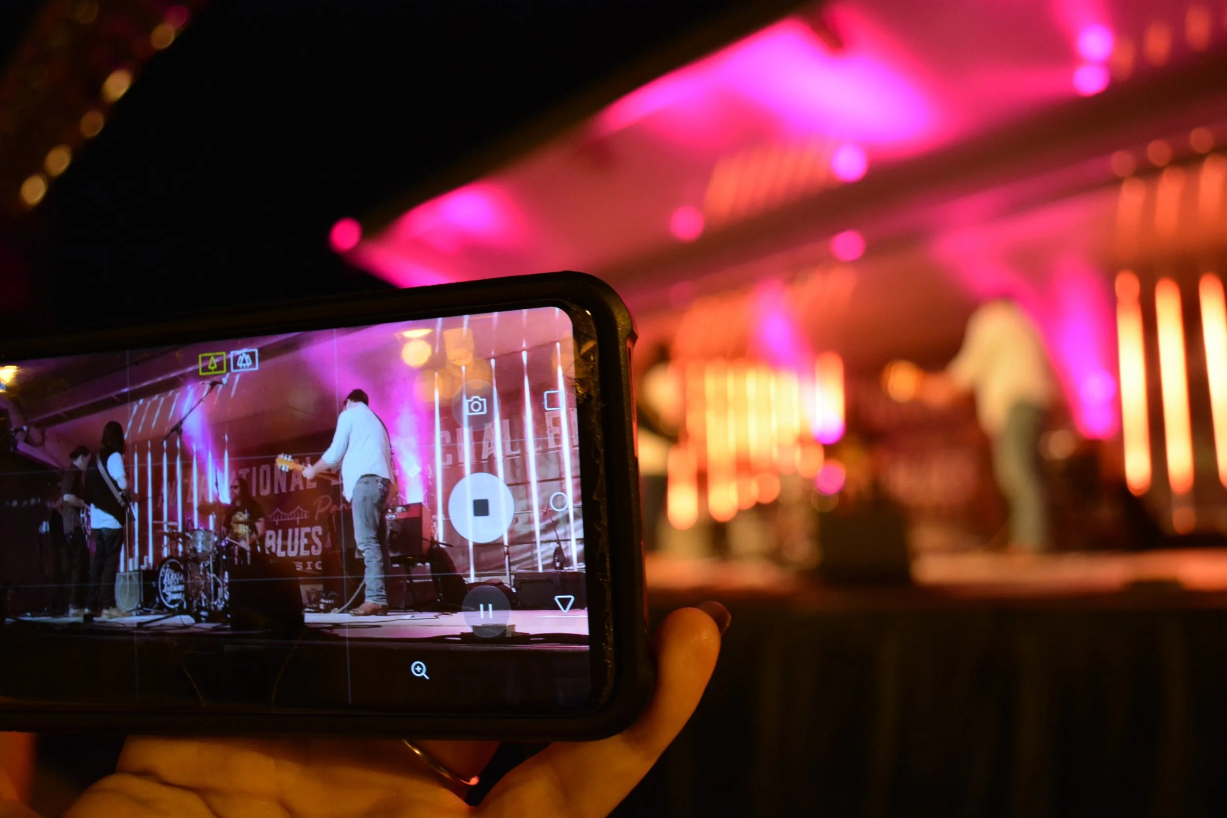 I took a photo of myself recording Arlo McKinley at the Peoria Blues & Heritage Fest this weekend, and I have to admit, my favorite part of this photo is the ring you see peeking out from under the phone. (For those who hadn’t heard yet, October 9th is the big day!)