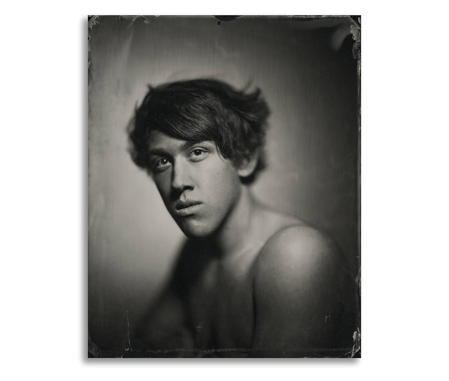 A well exposed Black glass or Perspex Ambrotype is a thing of beauty, along with the shallow depth of field from old petzval lenses and the absence of grain in the emulsion they can give an almost holographic effect to the plates. However I still embrace the digital age to extend the possibilities of the medium. The Ambrotype is a one off but can still be used in a similar way to a negative in that given a good scanner the images can still have a life off of the plate. In the late 1800’s the boom in the Carte du Visite cards which were mass produced prints from the collodion negatives started the idea of having lots of copies of the same image at very low cost. Ever since then, at least until the digital age, skilled printers produced prints from gelatine based negatives........