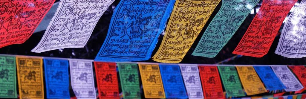 Prayer-Flags-1024x331.jpg