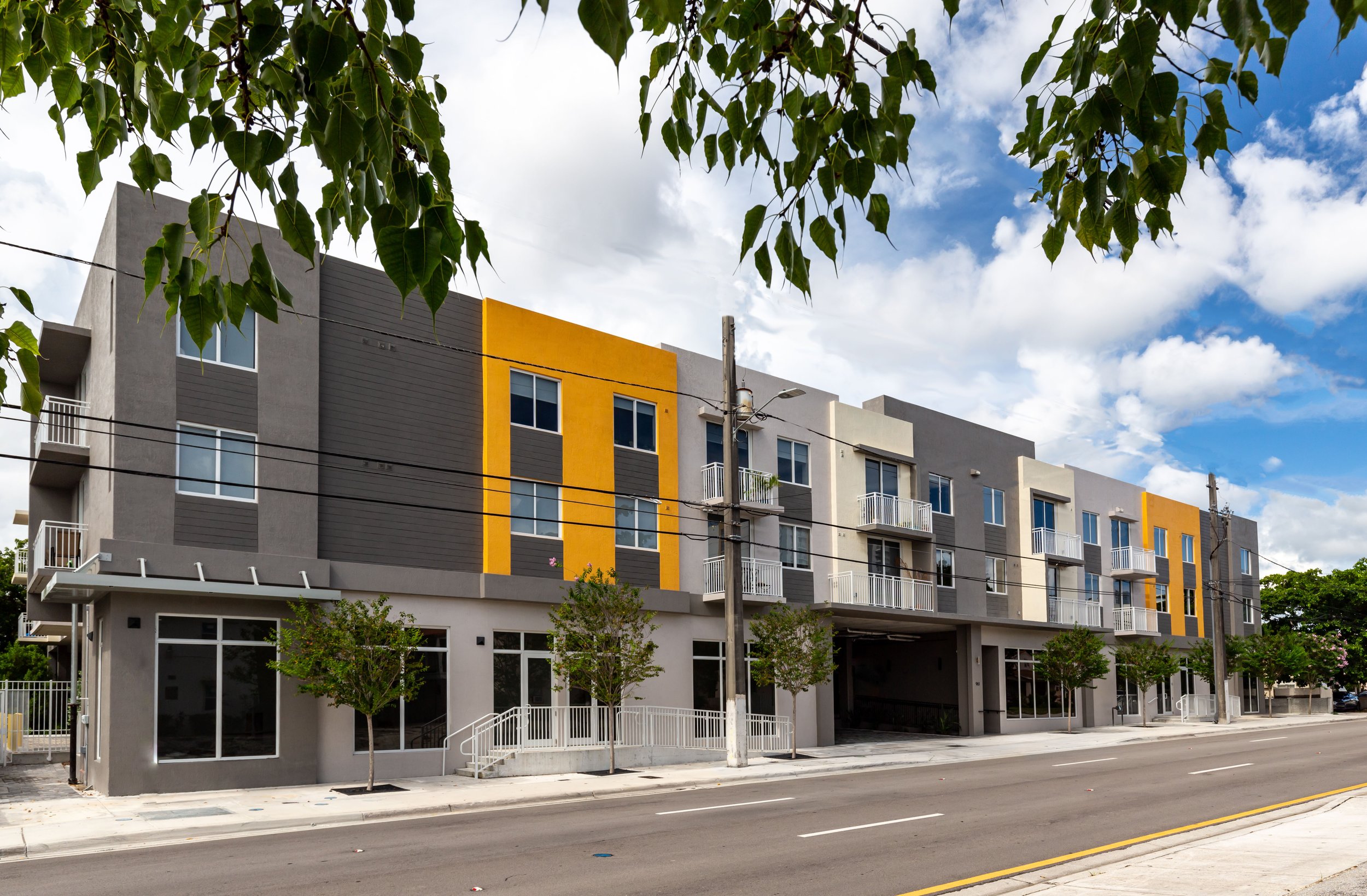 48 units total, of which 44 residential and 4 commercial spaces. Gated parking on the first floor with 60 parking spaces. The building has been equipped with over 100 solar panels which generate power for common areas. Completed in 2020.