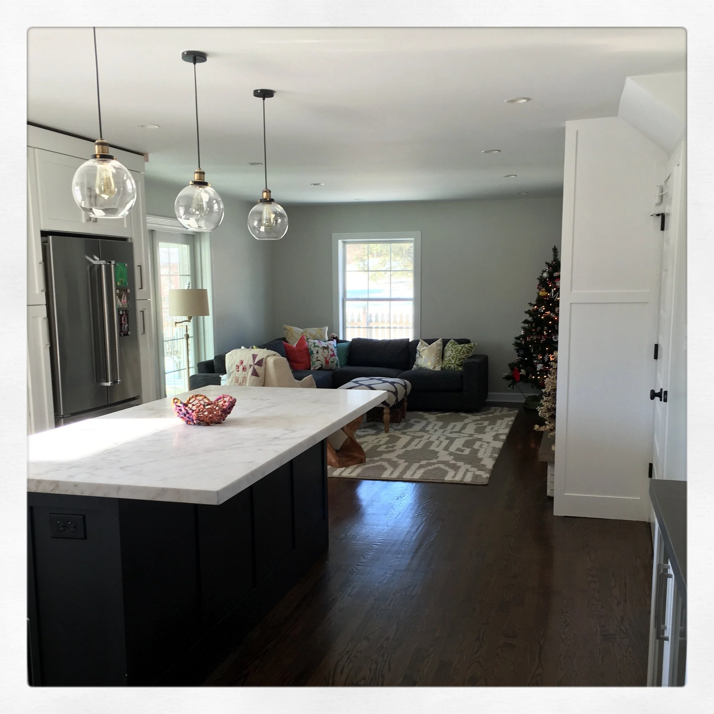 The original drywaller never showed up again, so our painter pulled through with a late night patch job to get our final inspections completed for us to move back in the week of Christmas! 