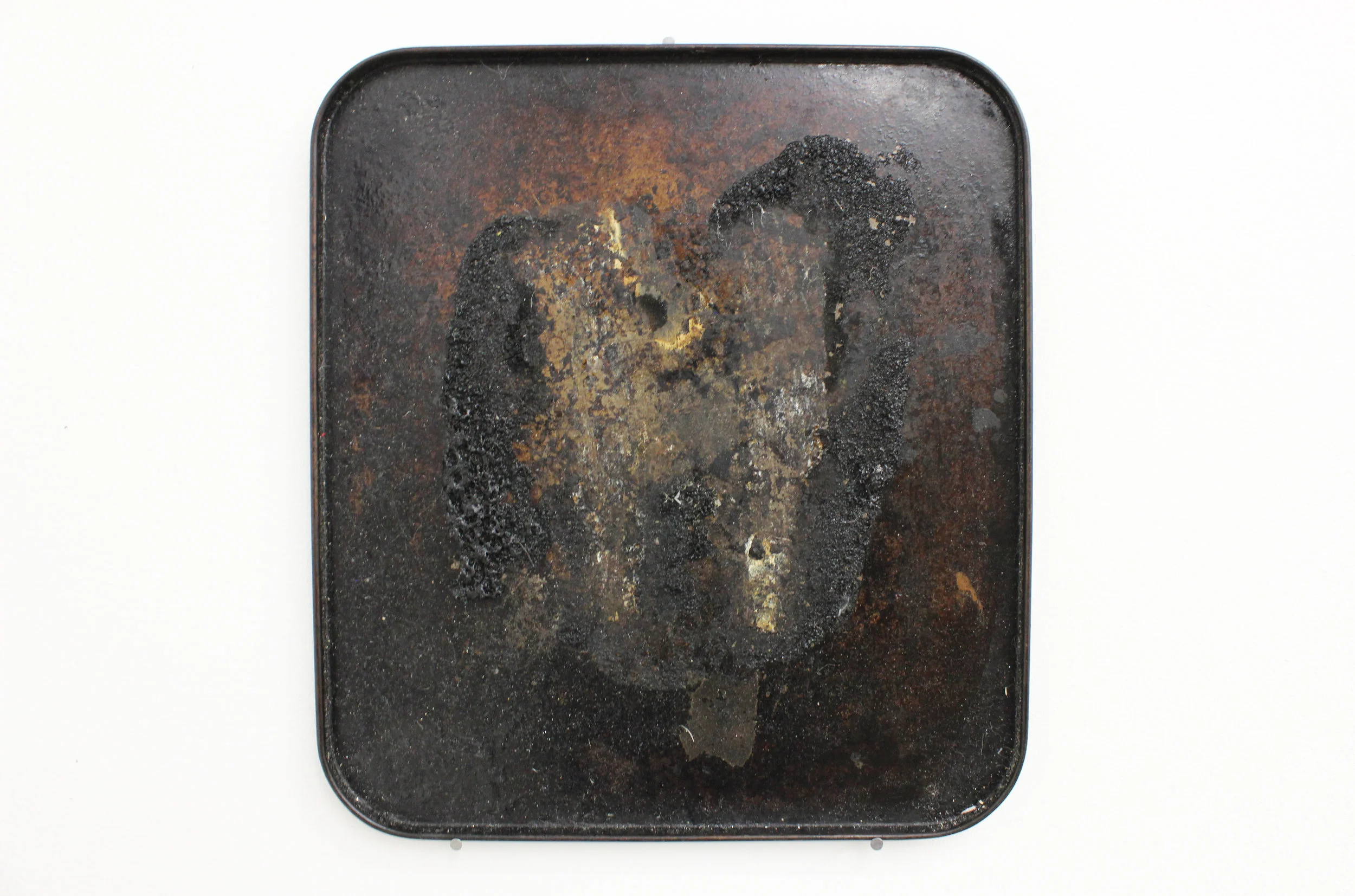 Burning, 2017 Baking tray, burned salmon