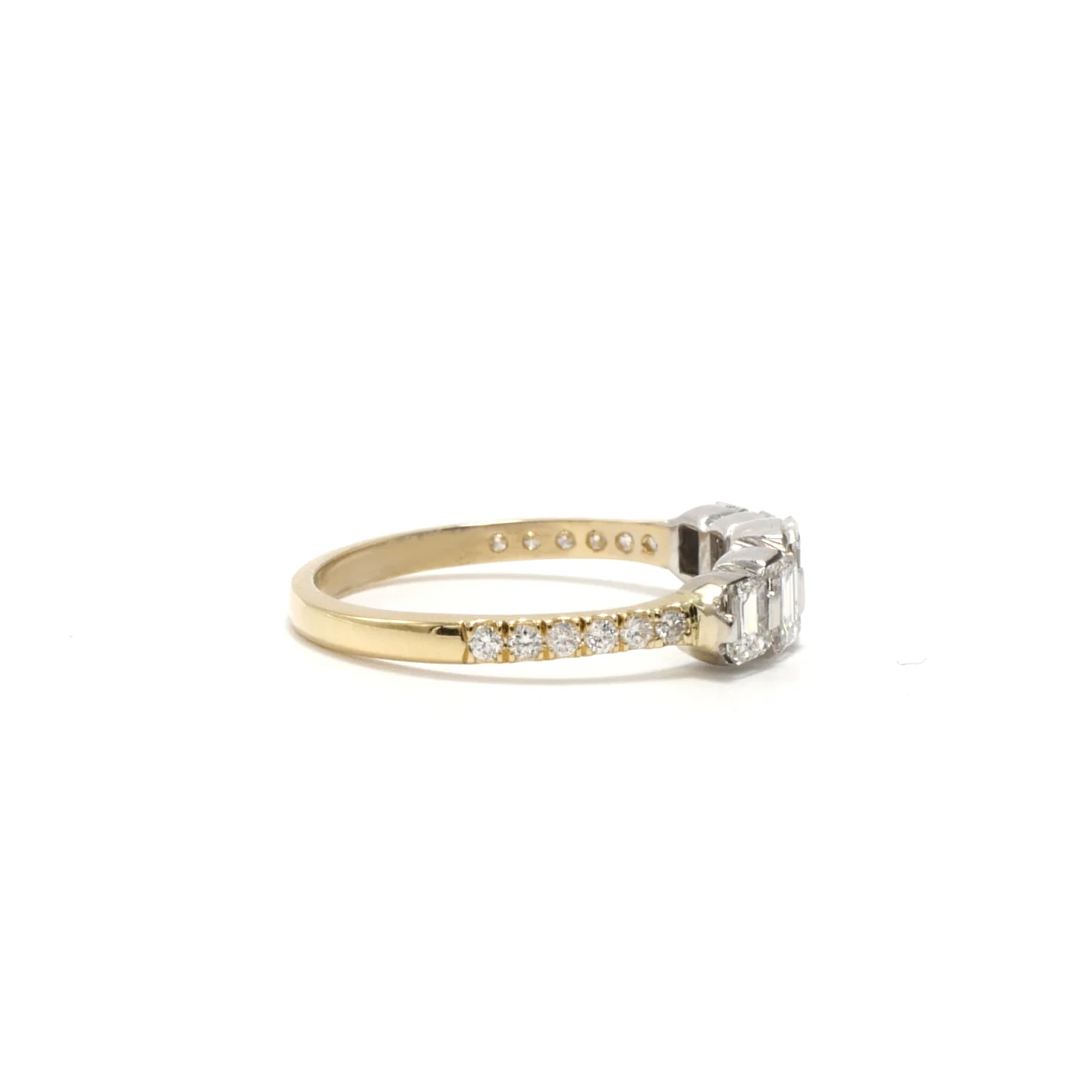 graduating emerald cut diamonds ring