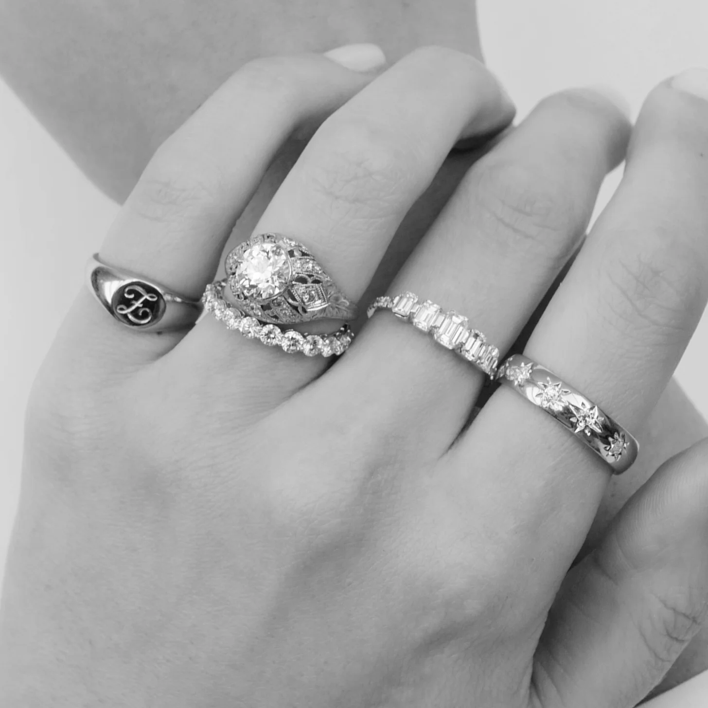 graduating emerald cut diamonds ring
