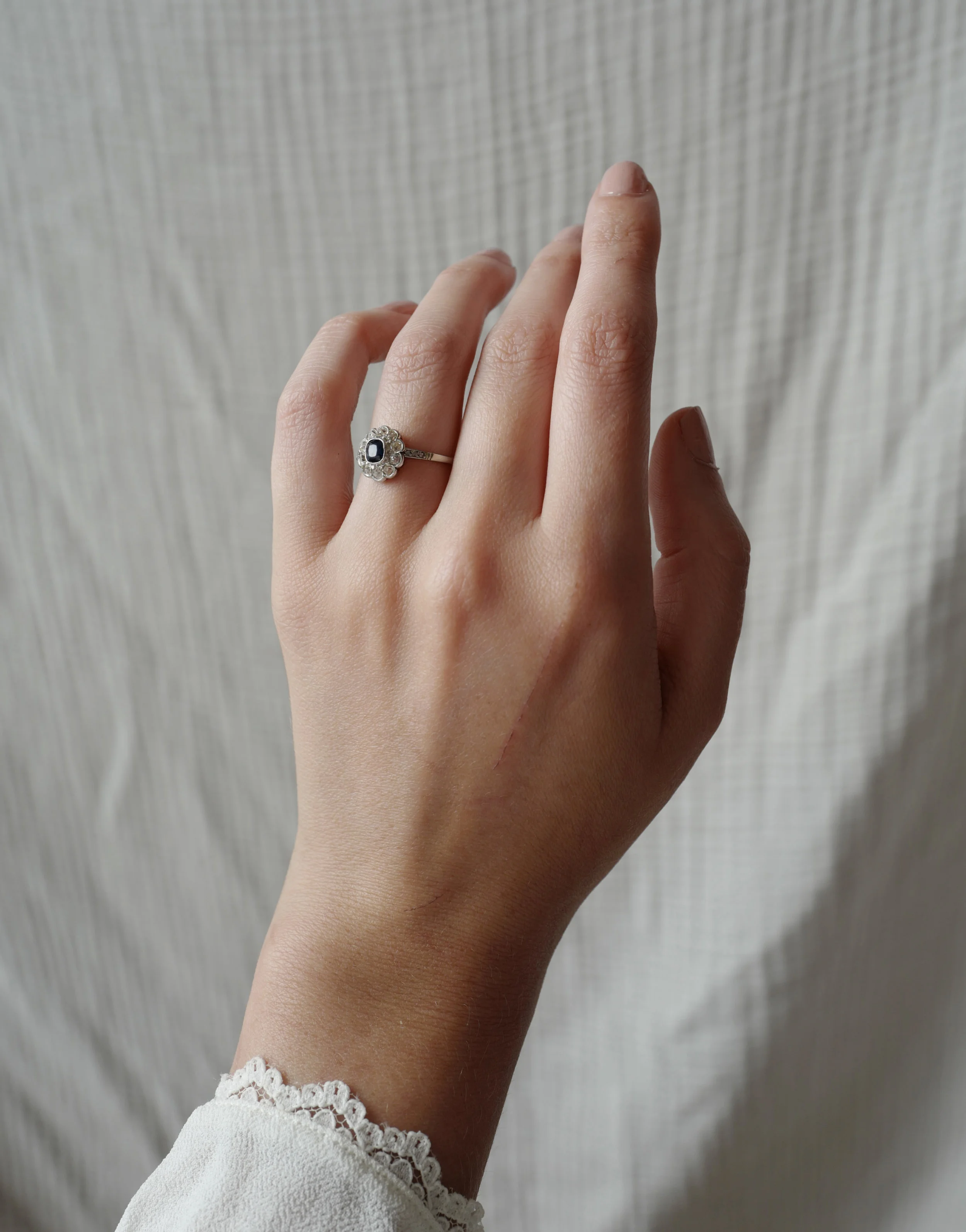 Art Deco cushion blue sapphire engagement ring