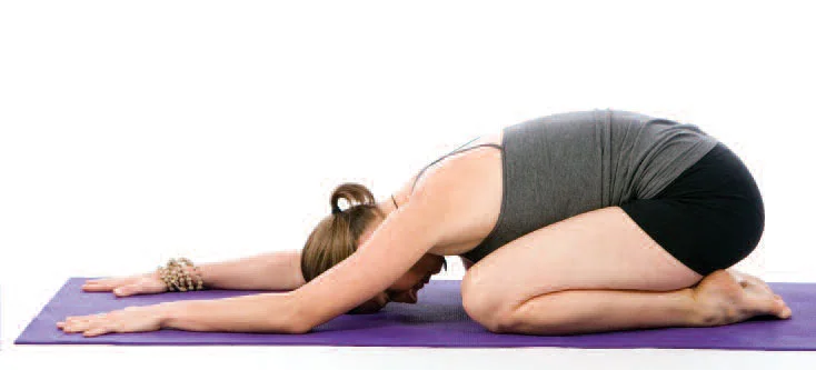 Child’s pose stretches the hips, thighs, and ankles along with the muscles on the front of the body while stretching the muscles of the back torso. This resting pose centers, calms, and soothes the brain, making it a therapeutic posture for relieving stress.