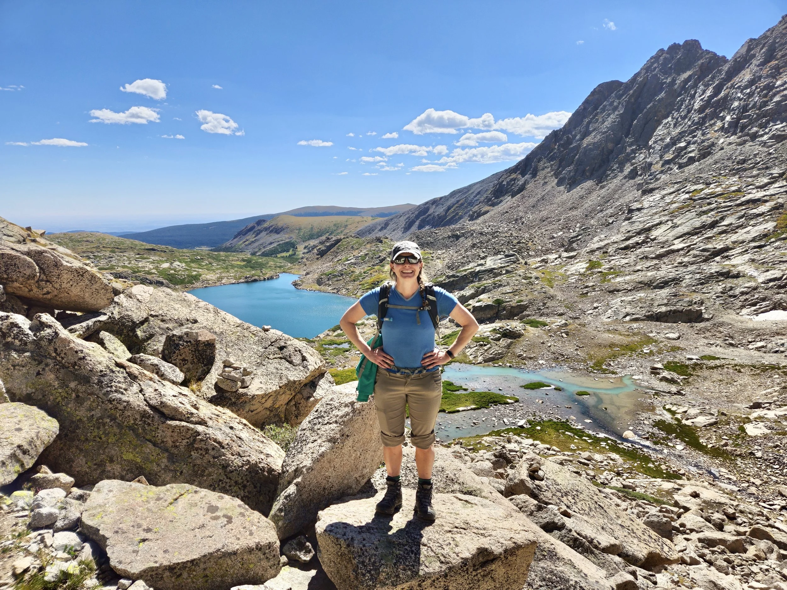 Becky hiking up Mount Audubon