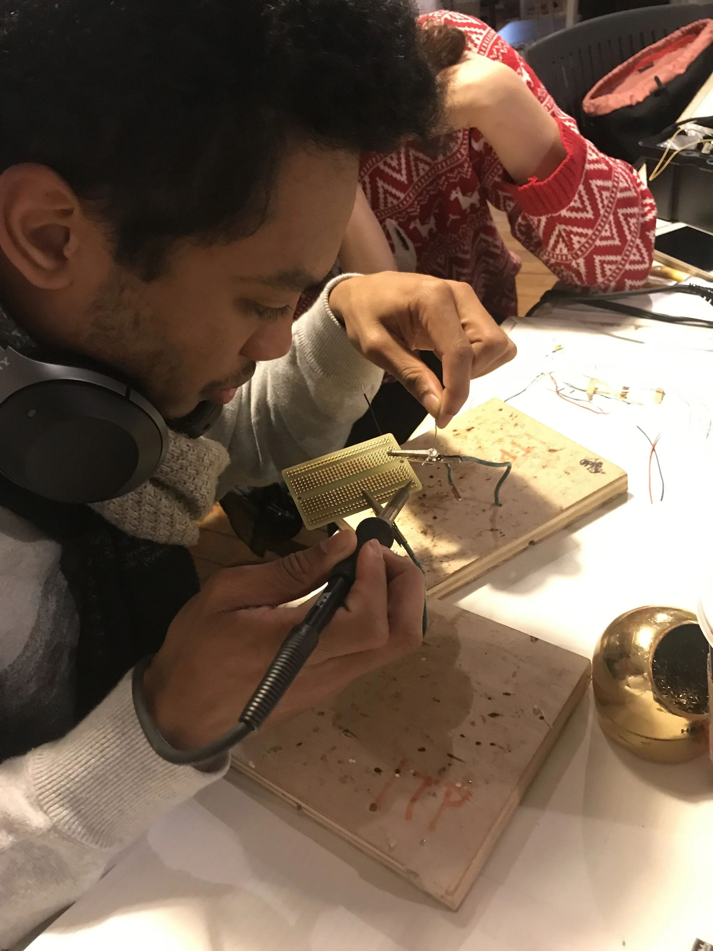 Solder —>