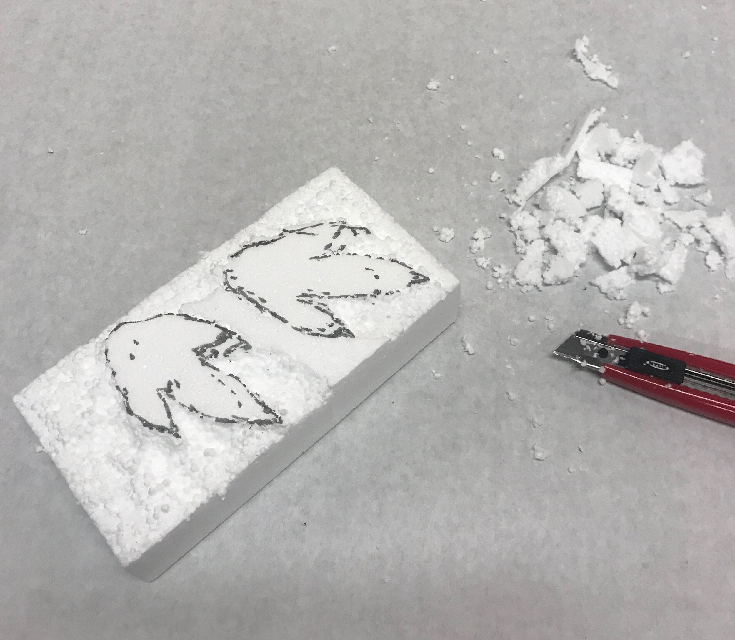  cutting foam with x-acto knife 