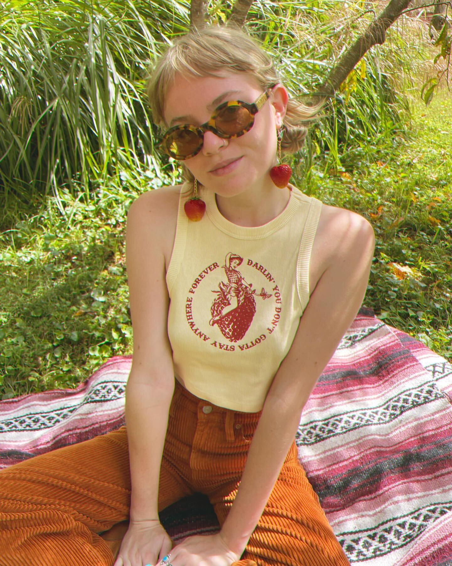 THEY'RE BACK❣️
Existential Cowgirl Tanks in two new colorways: Brick Red &amp; Mocha Brown on the cutest 100% cotton Butter Yellow cropped tanks 🤩
35 of these cuties will be available to purchase on my Etsy this Sunday at 8pm EST 💫⏰
Set your alarms