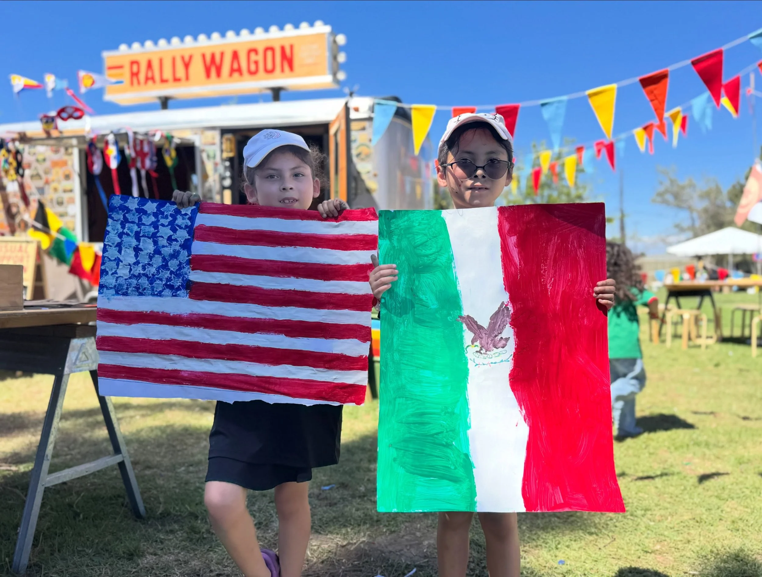 Rally Wagon Day 2 at Magic Johnson Park.
Close-ups, felt scraps, serious fans, small hands with big ideas, and another full day of beautiful chaos.
One of the best parts is watching people sit down at the tables and suddenly light up. Young people, g