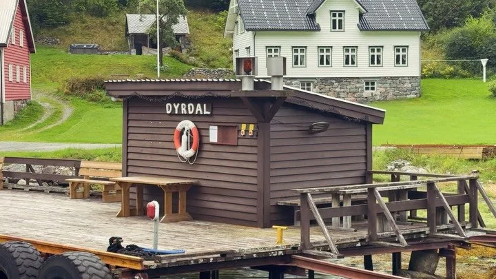 Trekking across Norway 🇳🇴: Days 4-5. Woke up in a cave, barely caught a ferry, floated through a handful of fjords, discovered a sister church, climbed 4000ft in under two miles 2 miles, tracked down an alpine lake, made lunch, read a chapter, pass