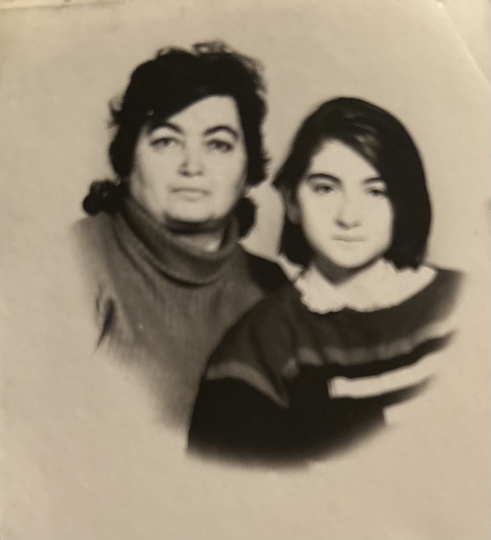    As I was a minor, I had to pose for visa photos alongside my mom. Circa 1993.   